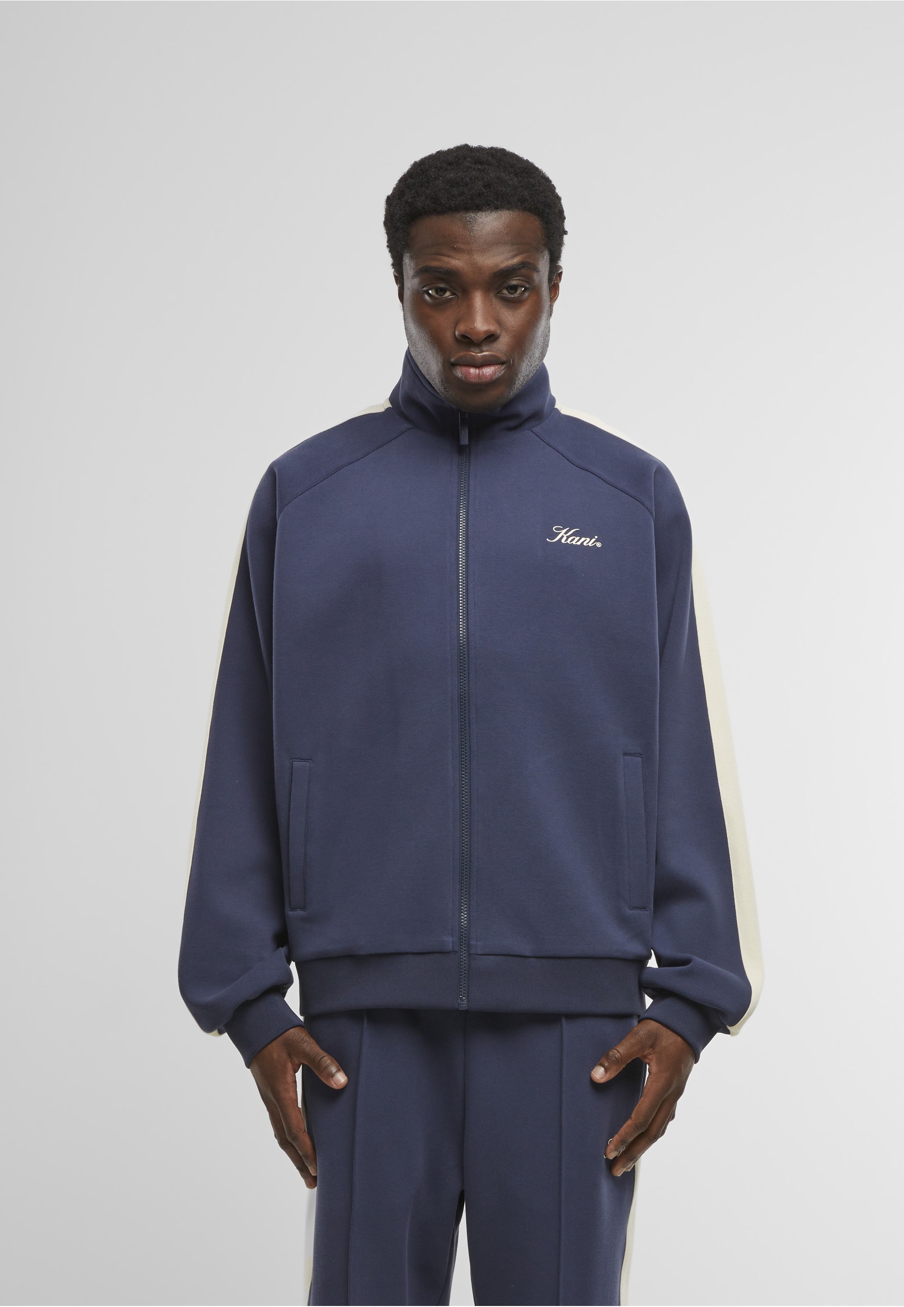 Karl Kani Trainingsjacke »Karl Kani Kani Sidestripe Trackjacket« 1 Stk. tlg. ohne Kapuze