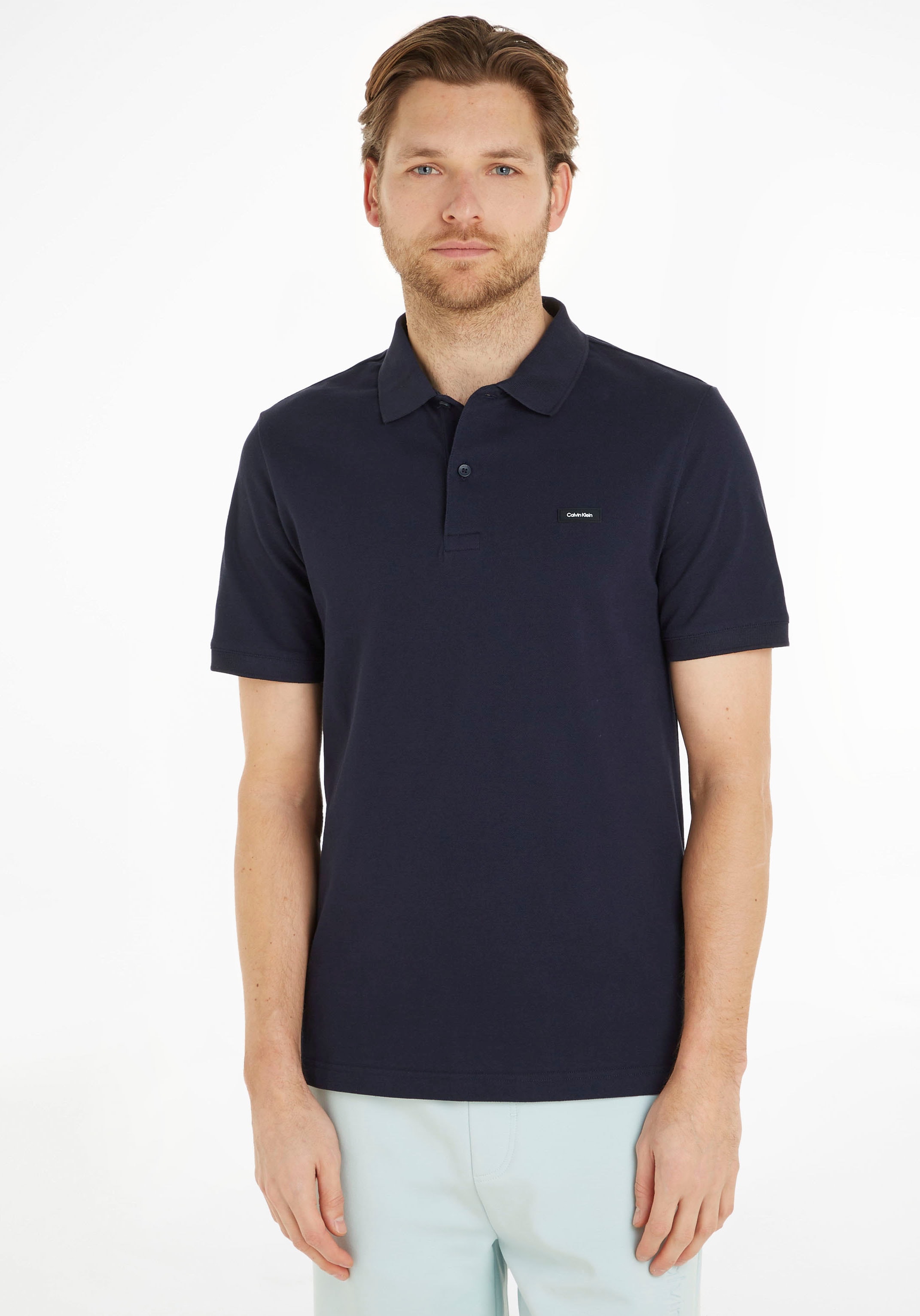 Calvin Klein Poloshirt, mit Calvin Klein Logo auf der Brust