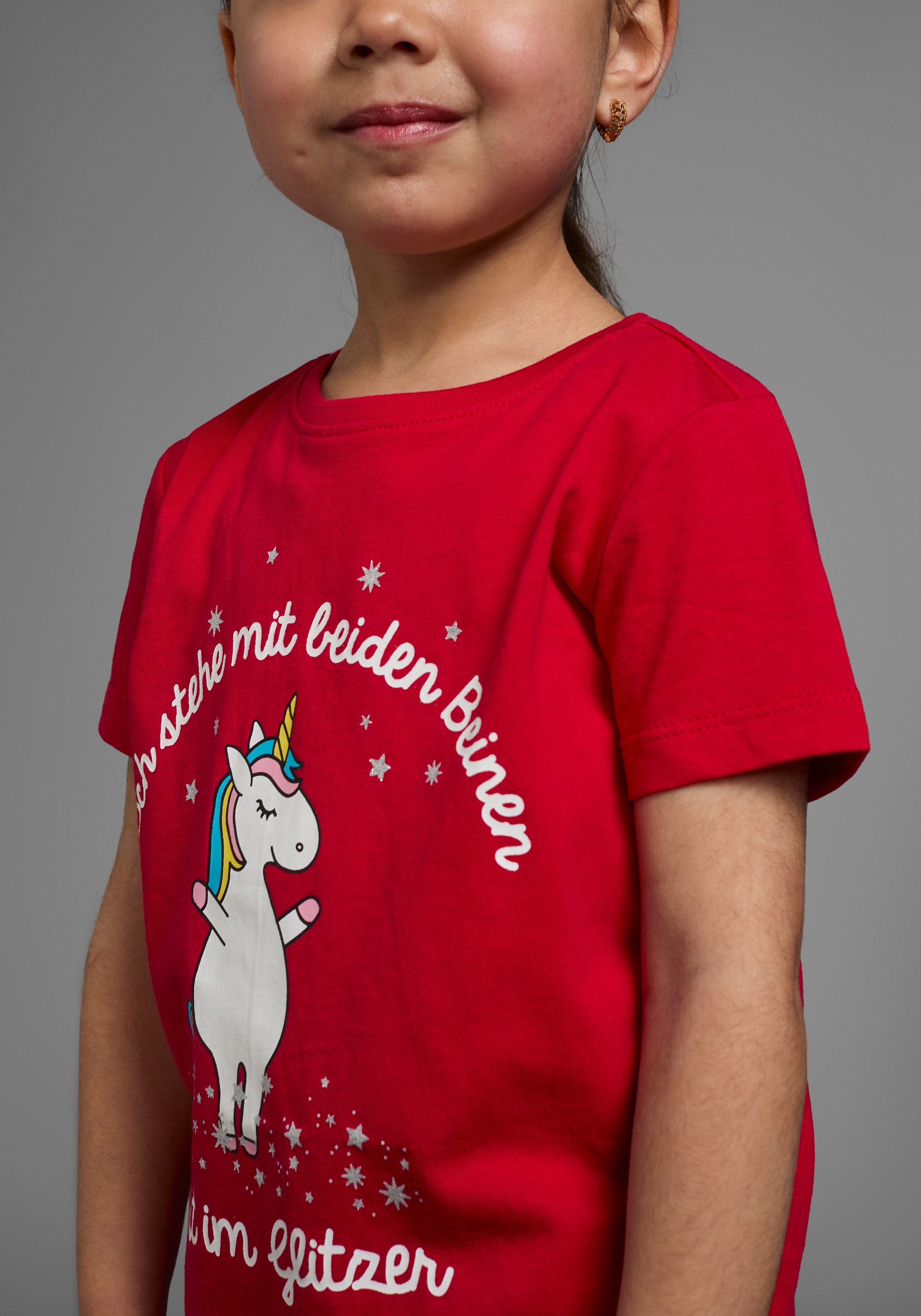 Thumbnail - KIDSWORLD T-Shirt "Mit Einhorn-Druck und Glitzereffekten" mit stylischem Einhorn-Print