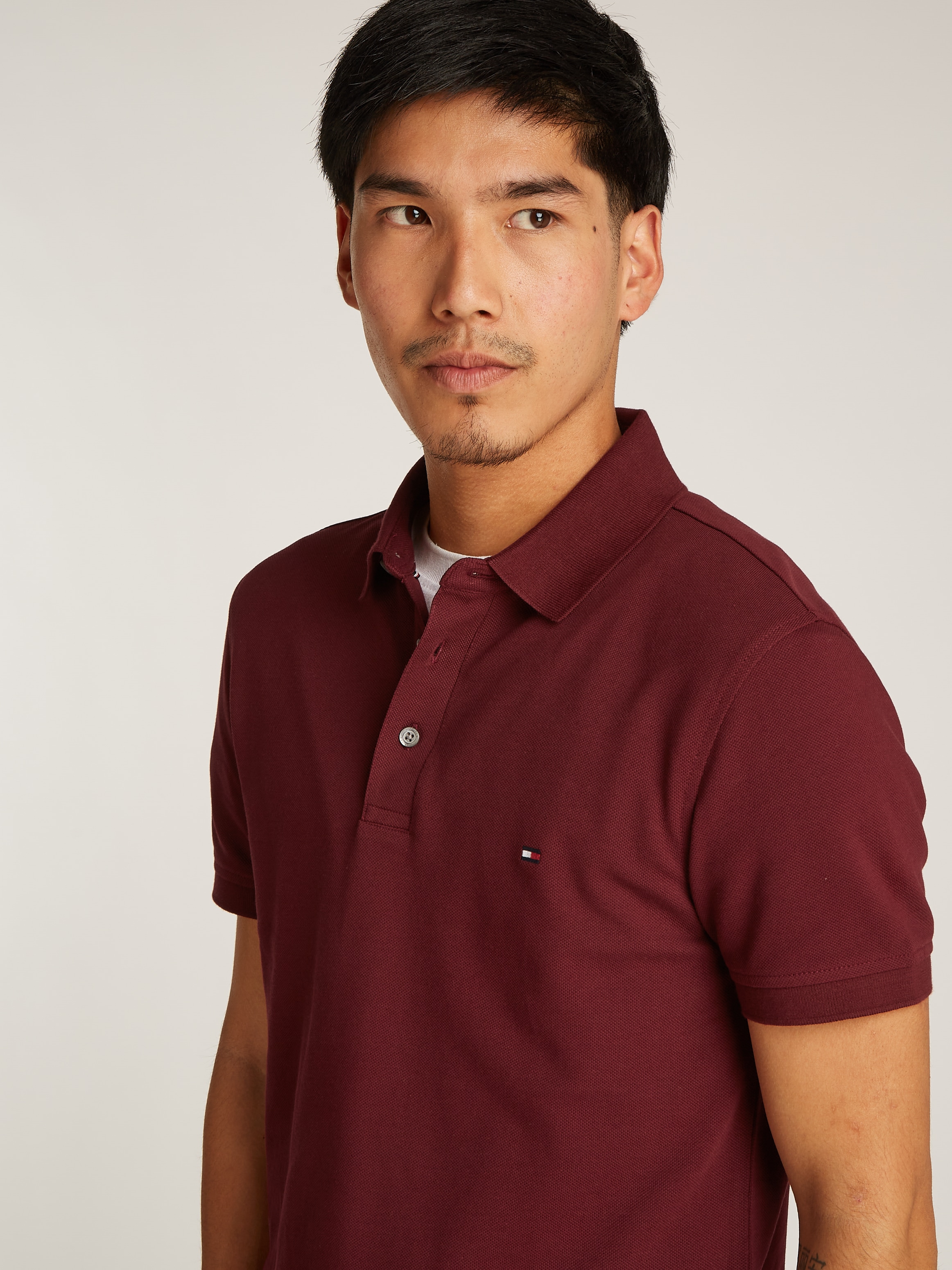 Tommy Hilfiger Poloshirt »1985 SLIM POLO«, aus leicht strukturiertem Piqué-Material