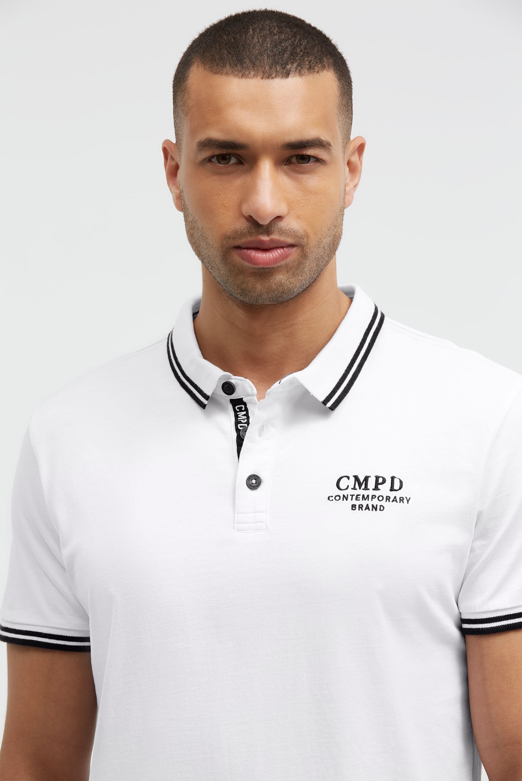 CMPD Poloshirt mit Seitenschlitze