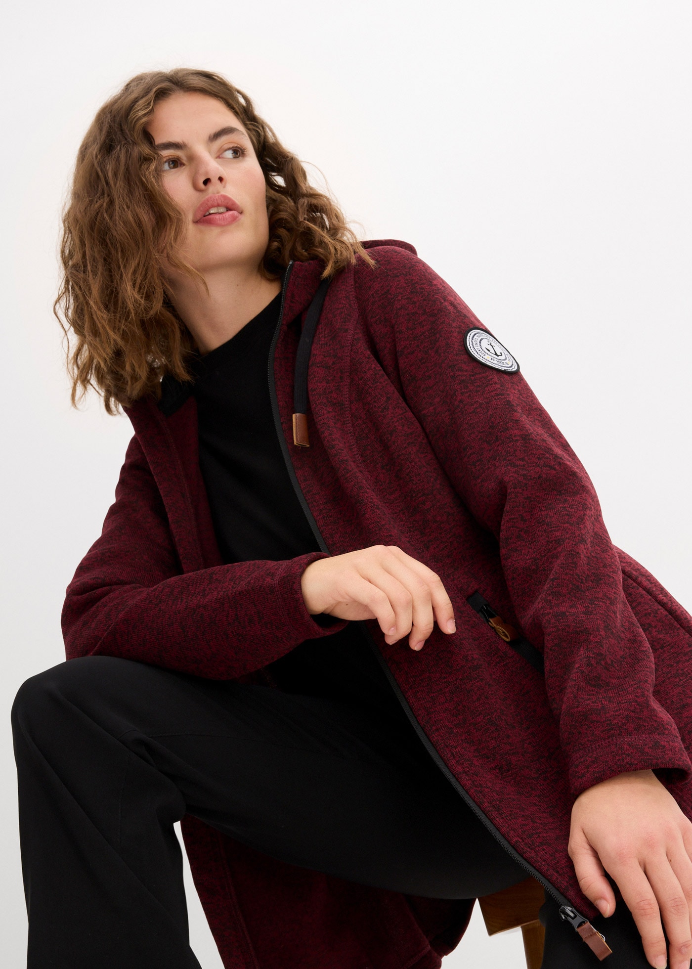 bonprix Strickfleecejacke 1 Stk. tlg. mit Kapuze bequeme Passform, mit Kapuze, mit verschließbaren Taschen