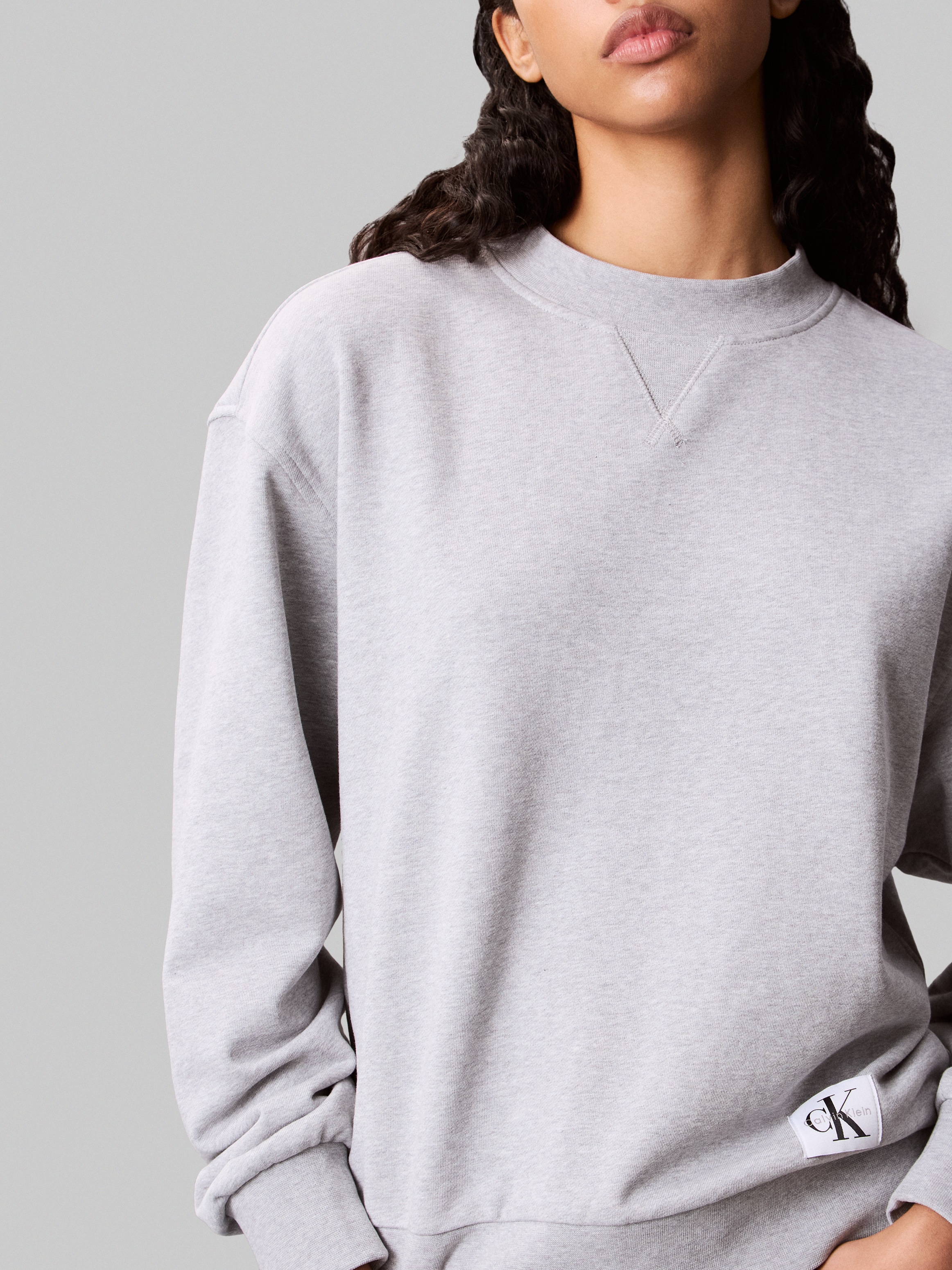 Calvin Klein Jeans Sweatshirt »A- LS BADGE LOGO TERRY CREW NK«, Mit Rundhalsausschnitt