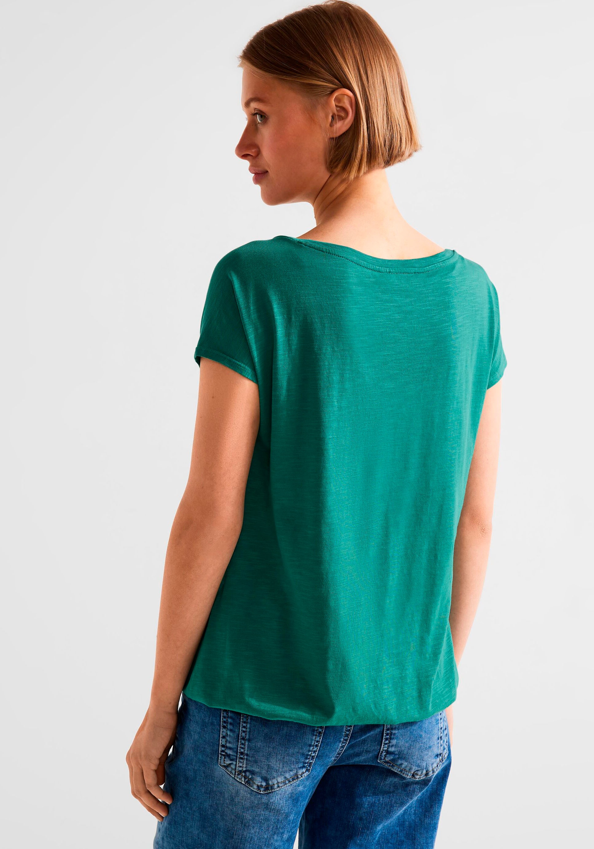 STREET ONE mit für elastischem BAUR | T-Shirt, Sitz Saum für perfekten bestellen