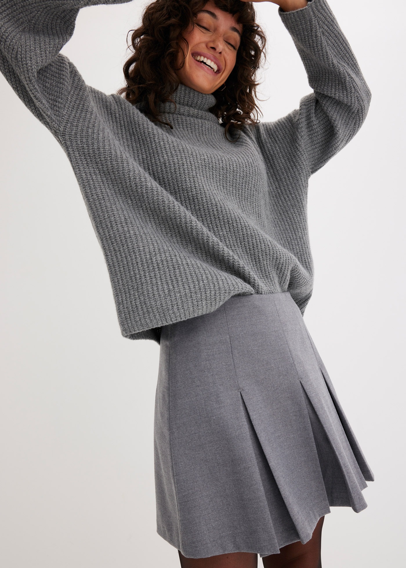 Thumbnail - bonprix Minirock aus Viskose-Mix, figurbetonte Passform, Faltenrock-Design