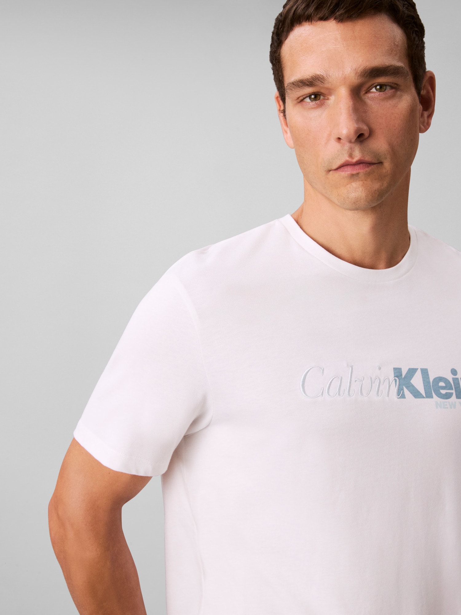 Calvin Klein T-Shirt »SS 20S EU CALVIN CURSIVE GRAPHIC«, Mit Rundhalsausschnitt, regular fit