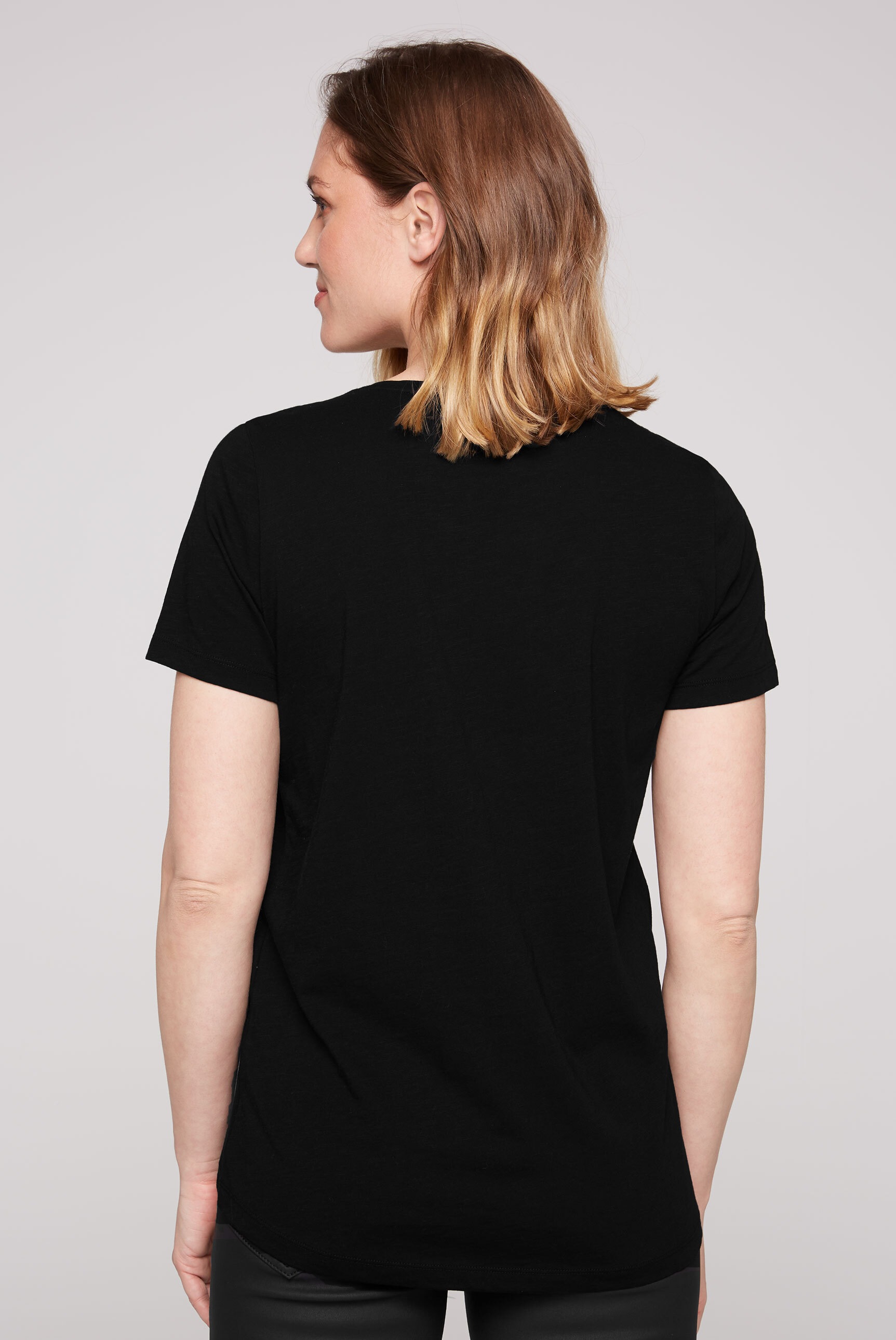 Rundhalsshirt, längerer BAUR kaufen | online mit SOCCX Rückenpartie