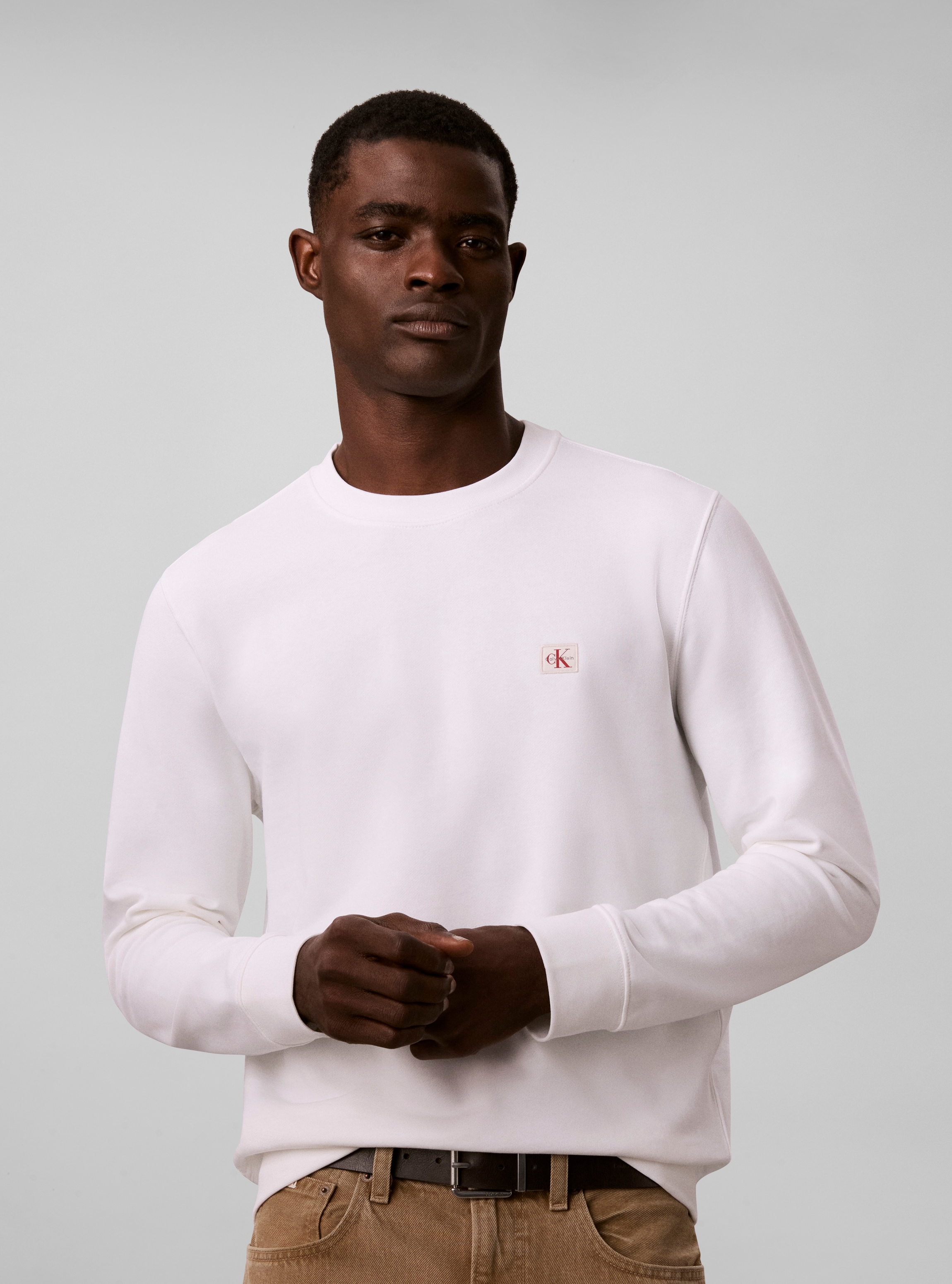 Calvin Klein Jeans Sweatshirt "WOVEN LABEL SWEATSHIRT", Regular fit mit Rundhalsausschnitt