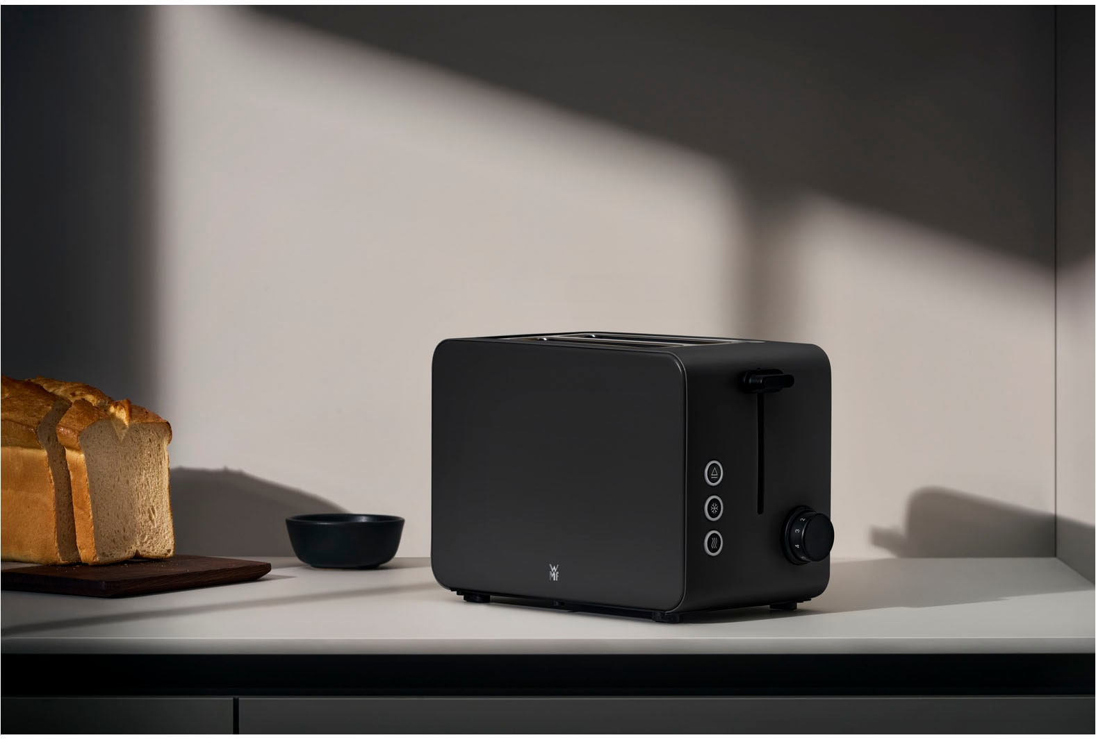 WMF Toaster »Stelio Edition Deep Black, 2-Scheiben-Toaster mit Brötchenaufsatz«, 2 kurze Schlitze, für 2 Scheiben, 1050 W, 7 Bräunungsstufen, Brotzentrierung, Krümelschublade, Cromargan Gehäuse