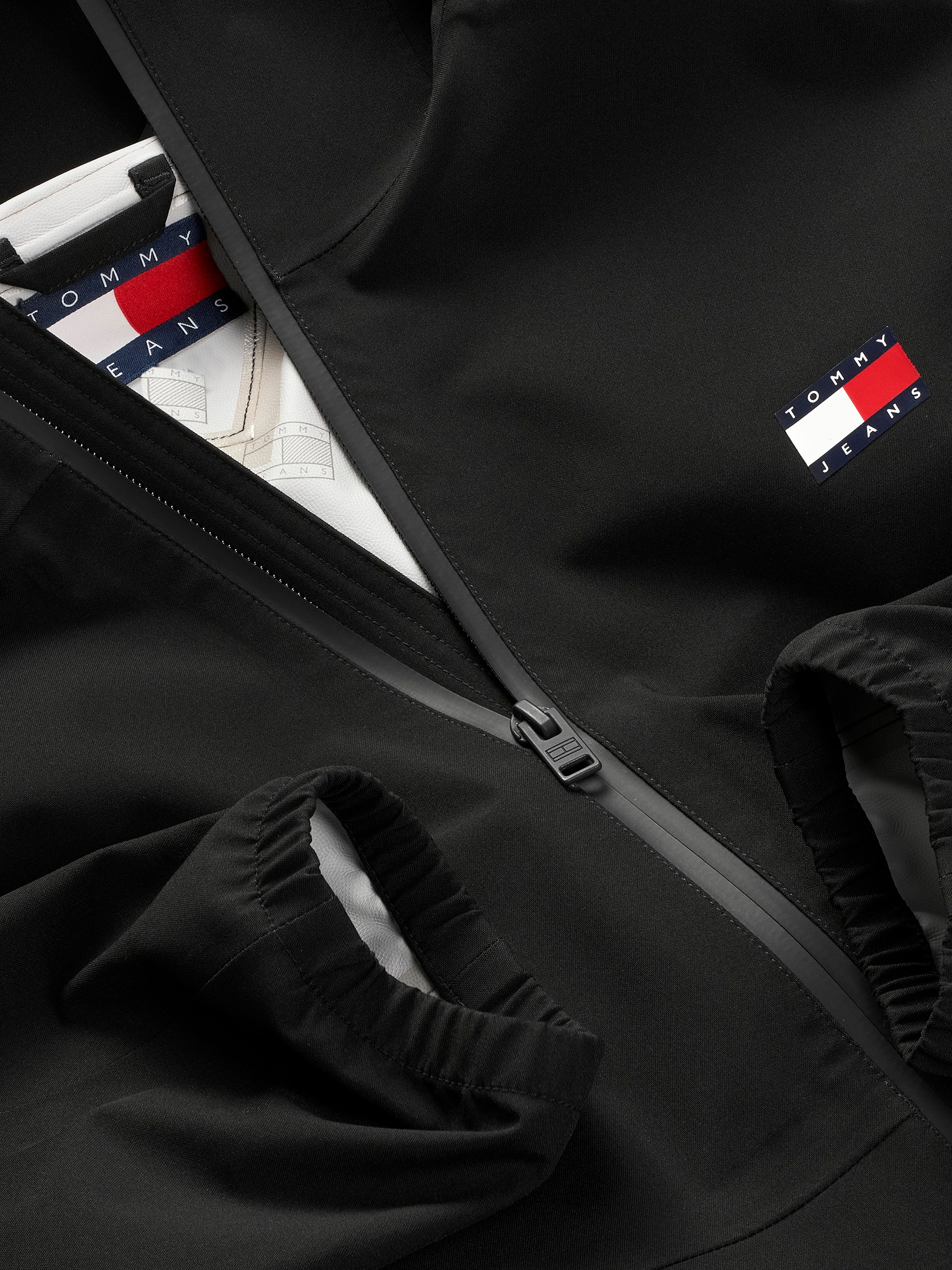 Tommy Jeans Blouson »TJM TECH WINDBREAKER«, mit Kapuze