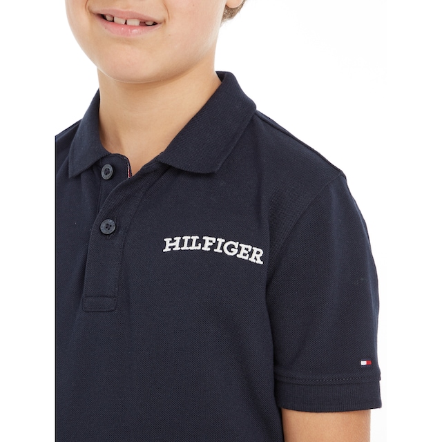 auf Friday ARCHED Hilfiger der Logo-Schriftzug Poloshirt Black mit | S/S«, POLO Hilfiger Brust »HILFIGER Tommy BAUR