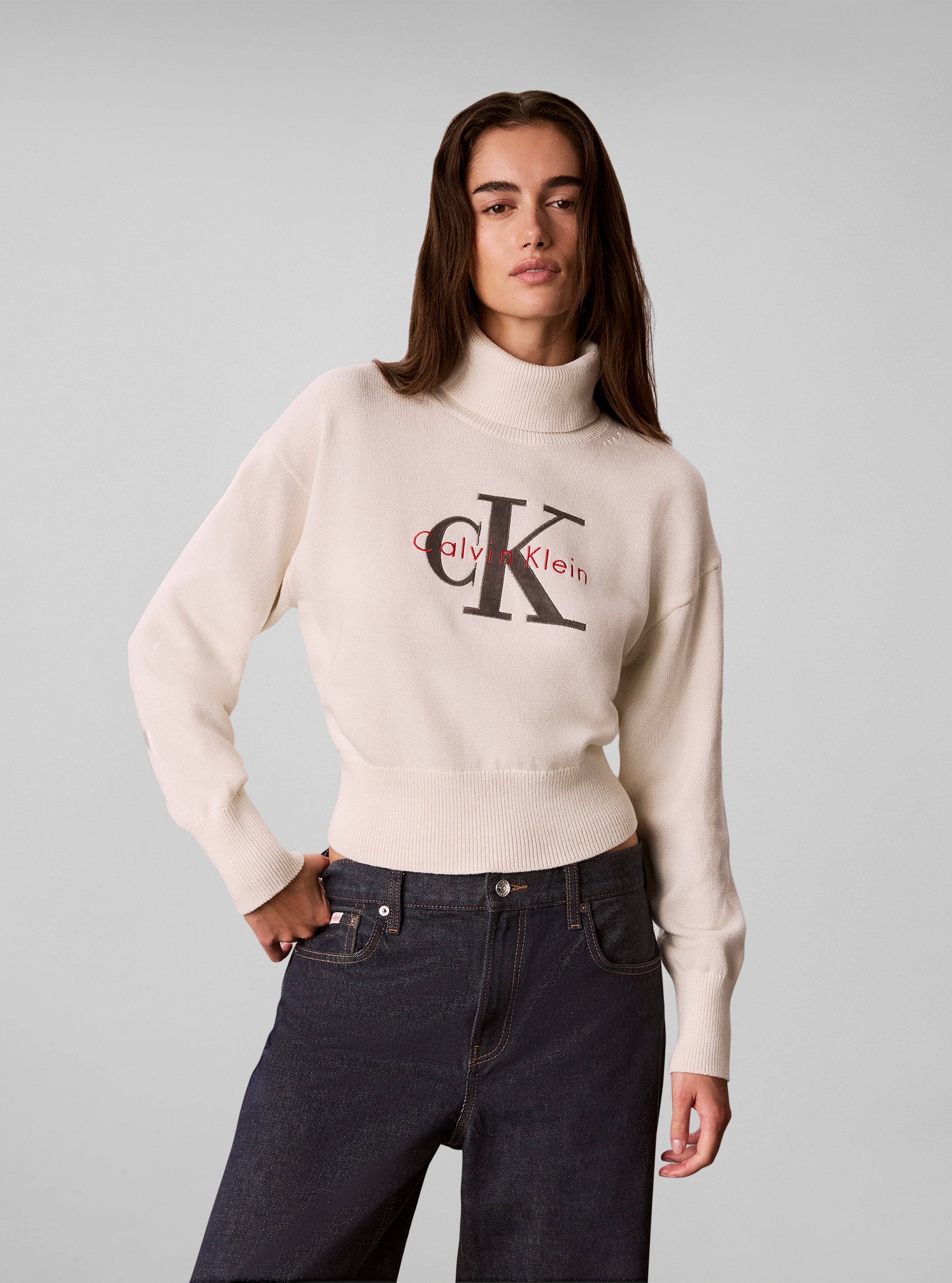 Calvin Klein Jeans Rollkragenpullover Rollkragen, breites Bündchen, Regular Fit, Applikation & Stickerei
