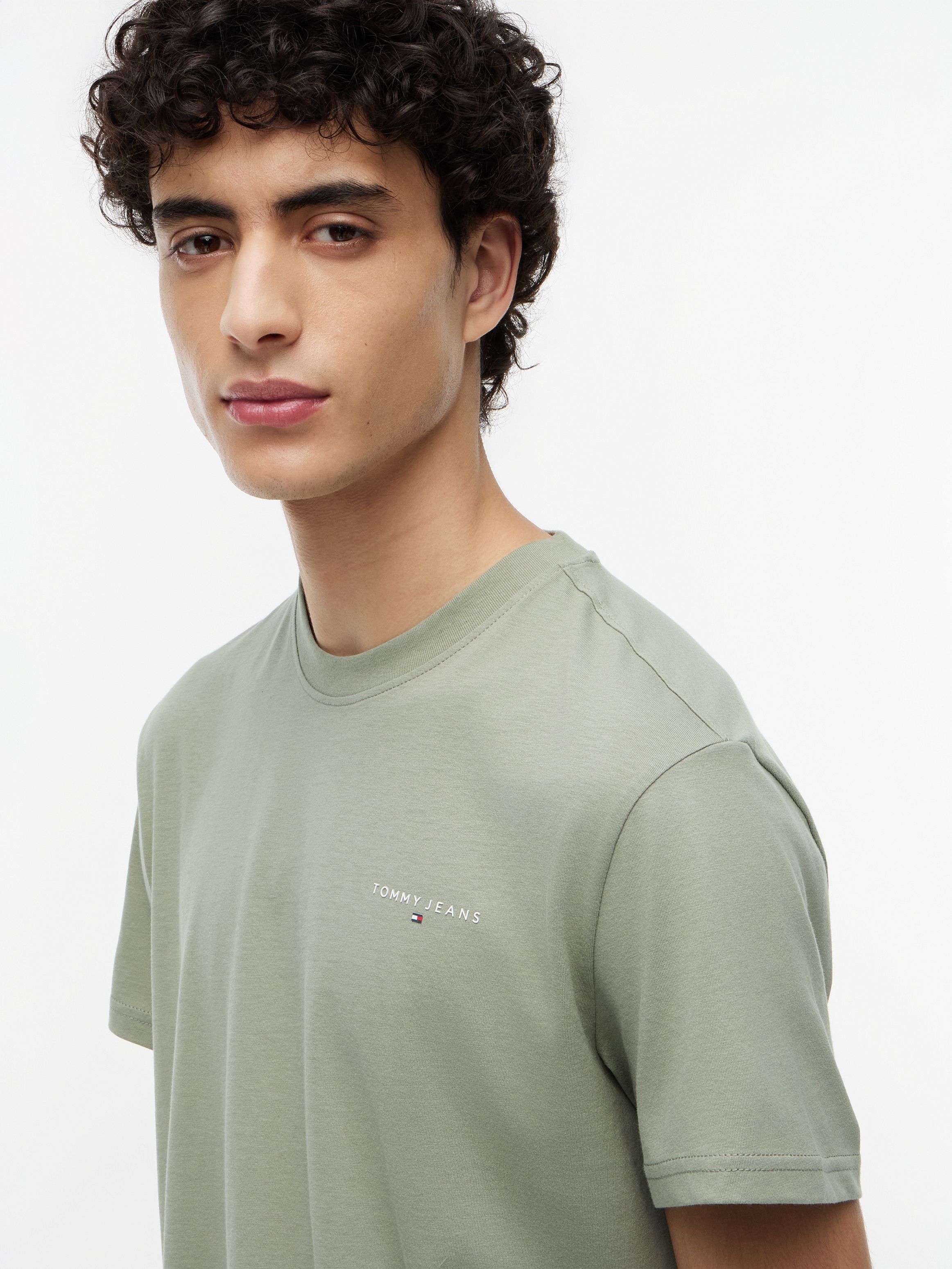 Tommy Jeans T-Shirt »TJM SLIM LINEAR CHEST TEE EXT« Mit Rundhalsausschnitt