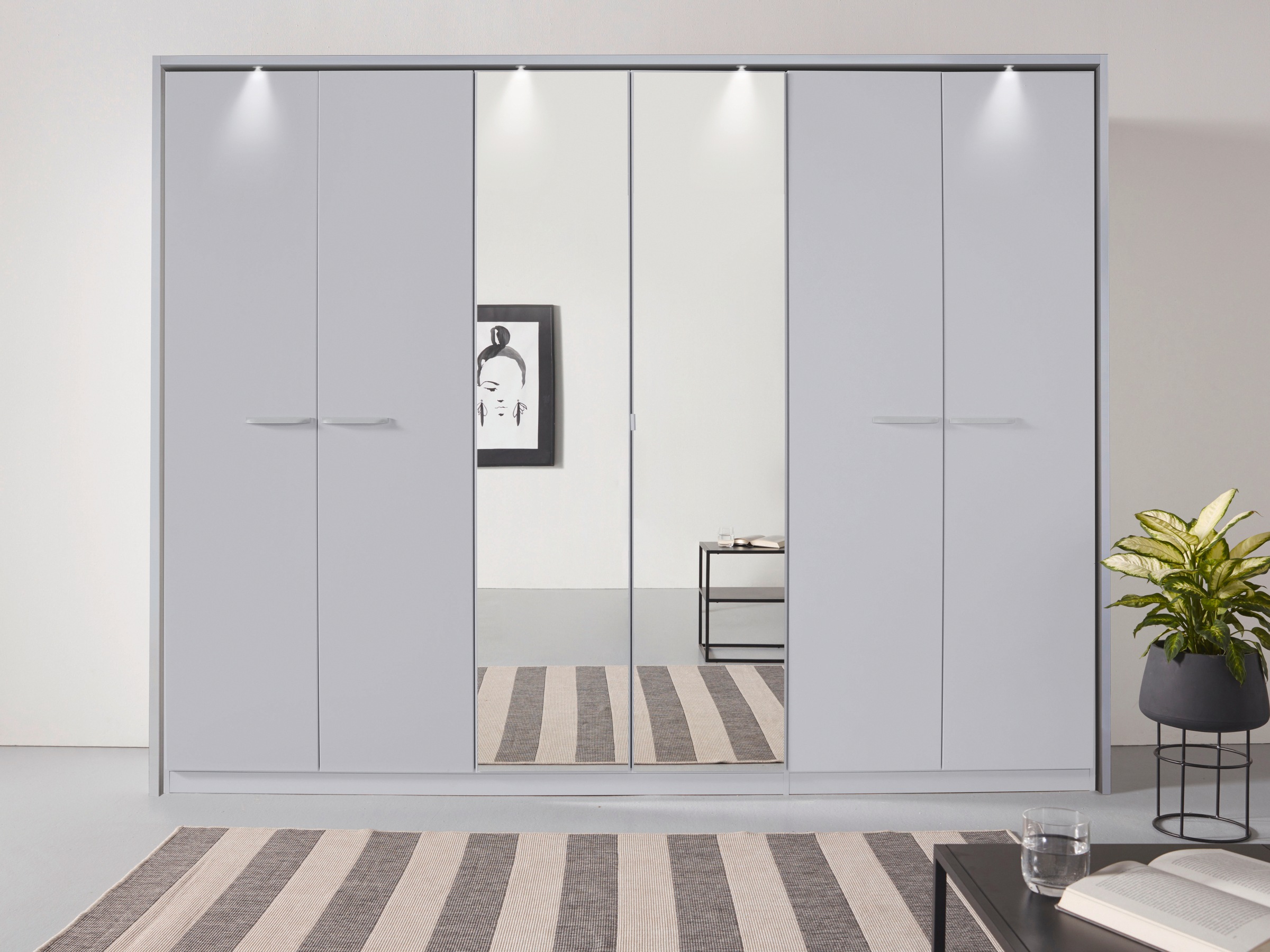 rauch Drehtürenschrank »Oteli«, mit Mittelspiegel und Passepartout optional mit Beleuchtung