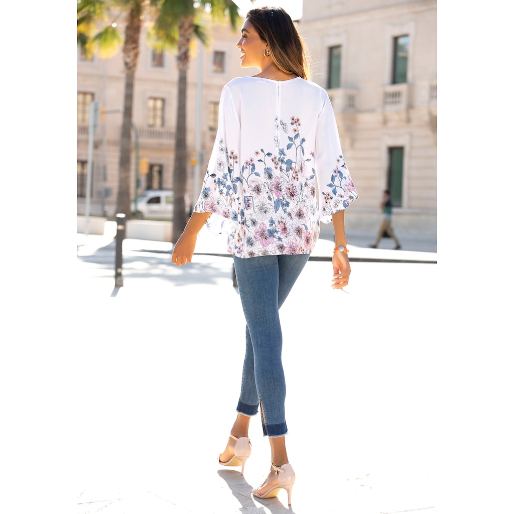 LASCANA Schlupfbluse, mit Blumenprint und Trompetenärmeln, Blusenshirt, sommerlich