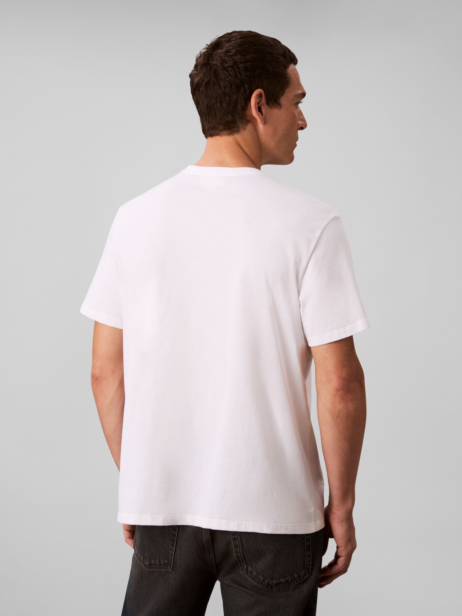 Calvin Klein T-Shirt »SS 20S EU CALVIN CURSIVE GRAPHIC«, Mit Rundhalsausschnitt, regular fit