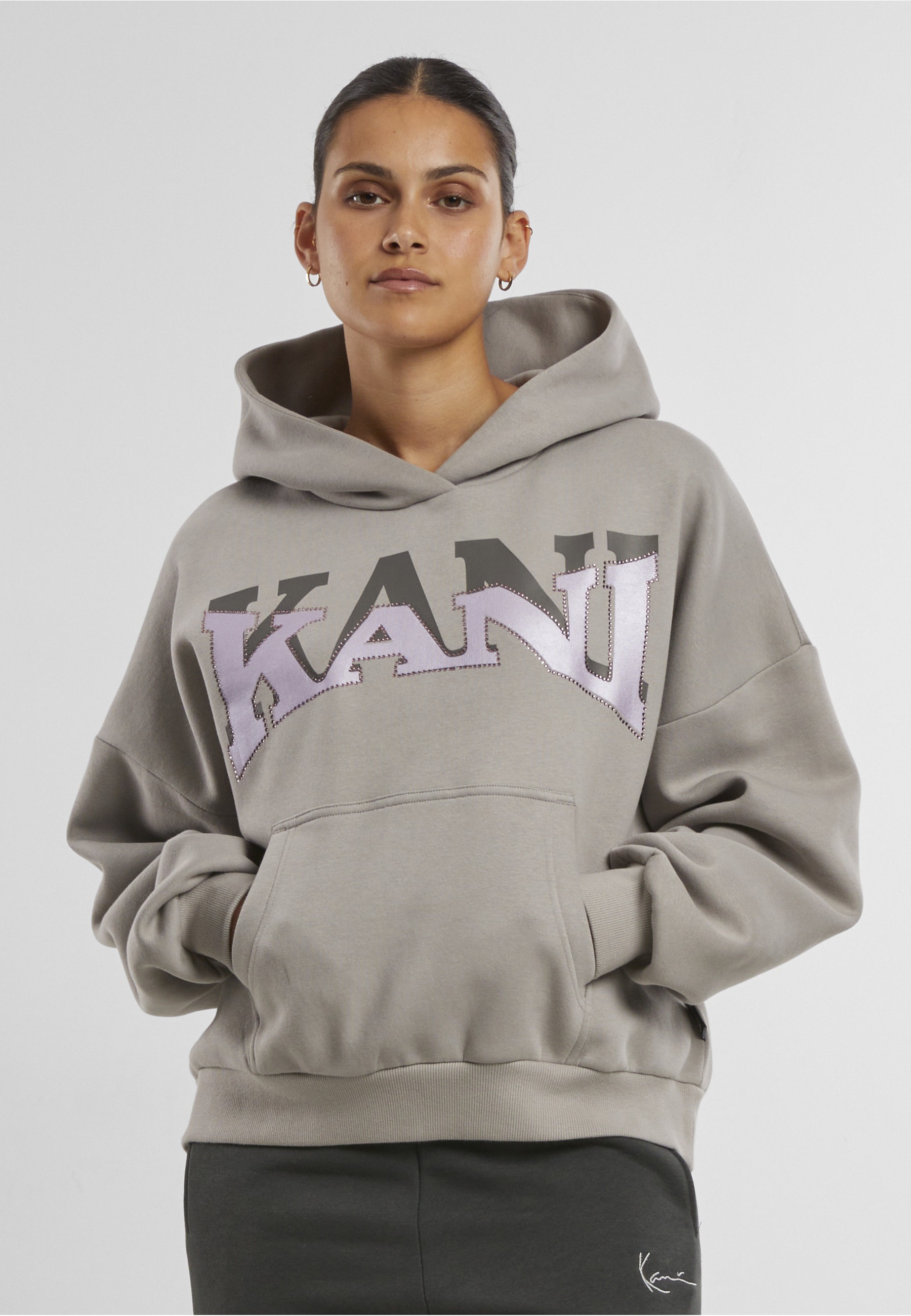 Thumbnail - Karl Kani Kapuzensweatshirt "Karl Kani KK Woven Signature Glitter Os Hoodie"