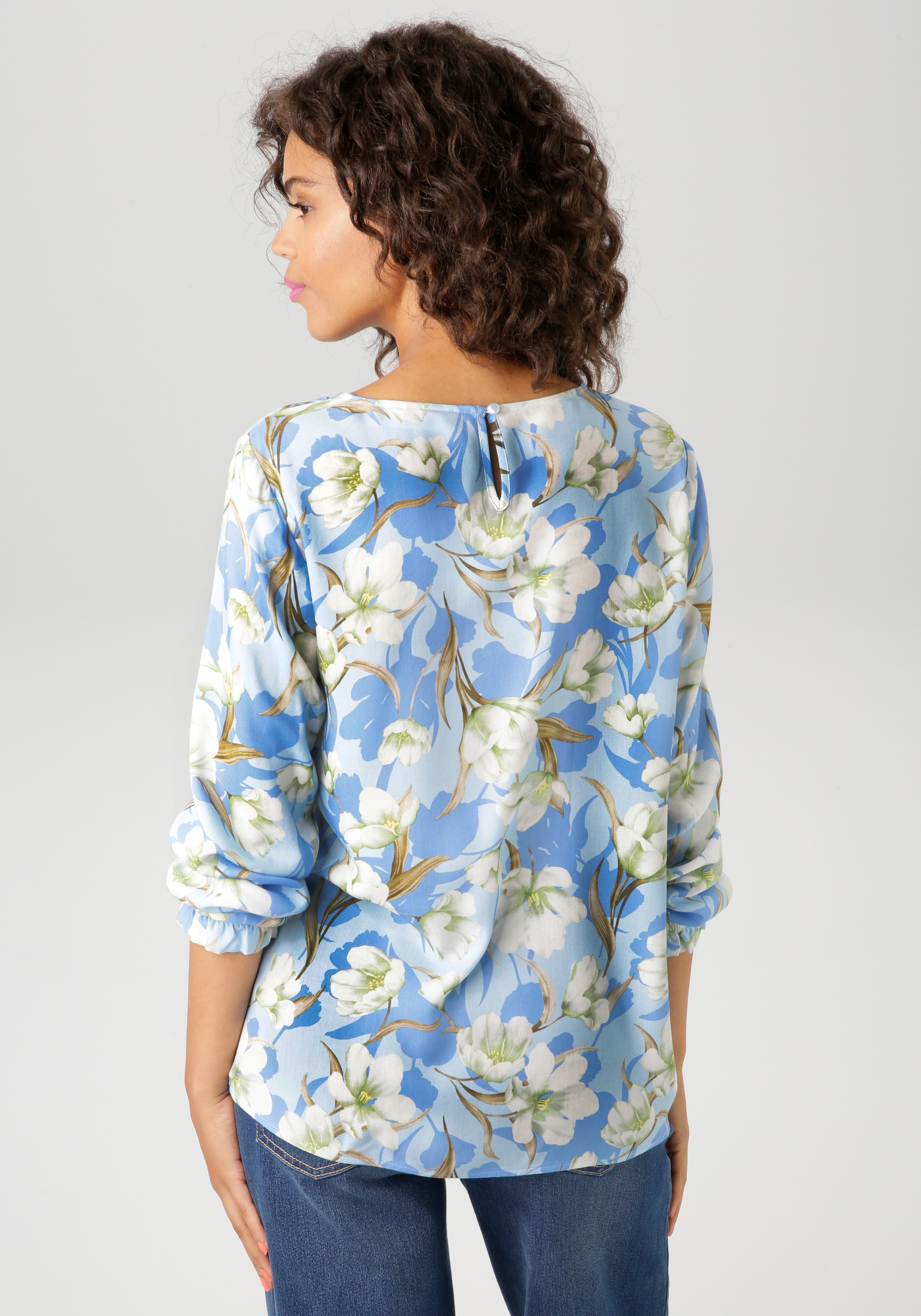 Aniston CASUAL Schlupfbluse, mit farbharmonischem Blumendruck günstig online kaufen