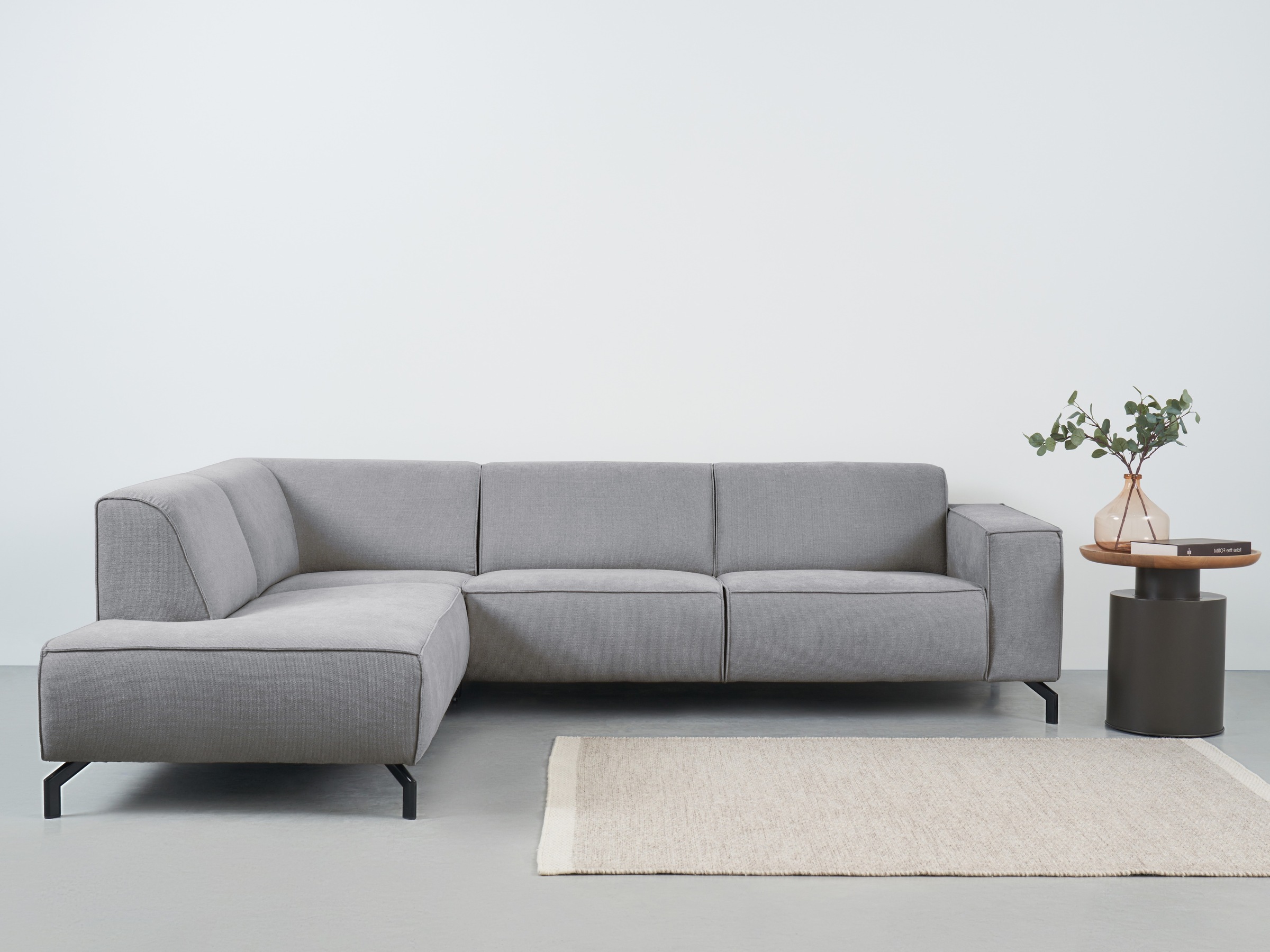 Places of Style Ecksofa Lorcan, in Lederoptik oder Strukturstoff lieferbar