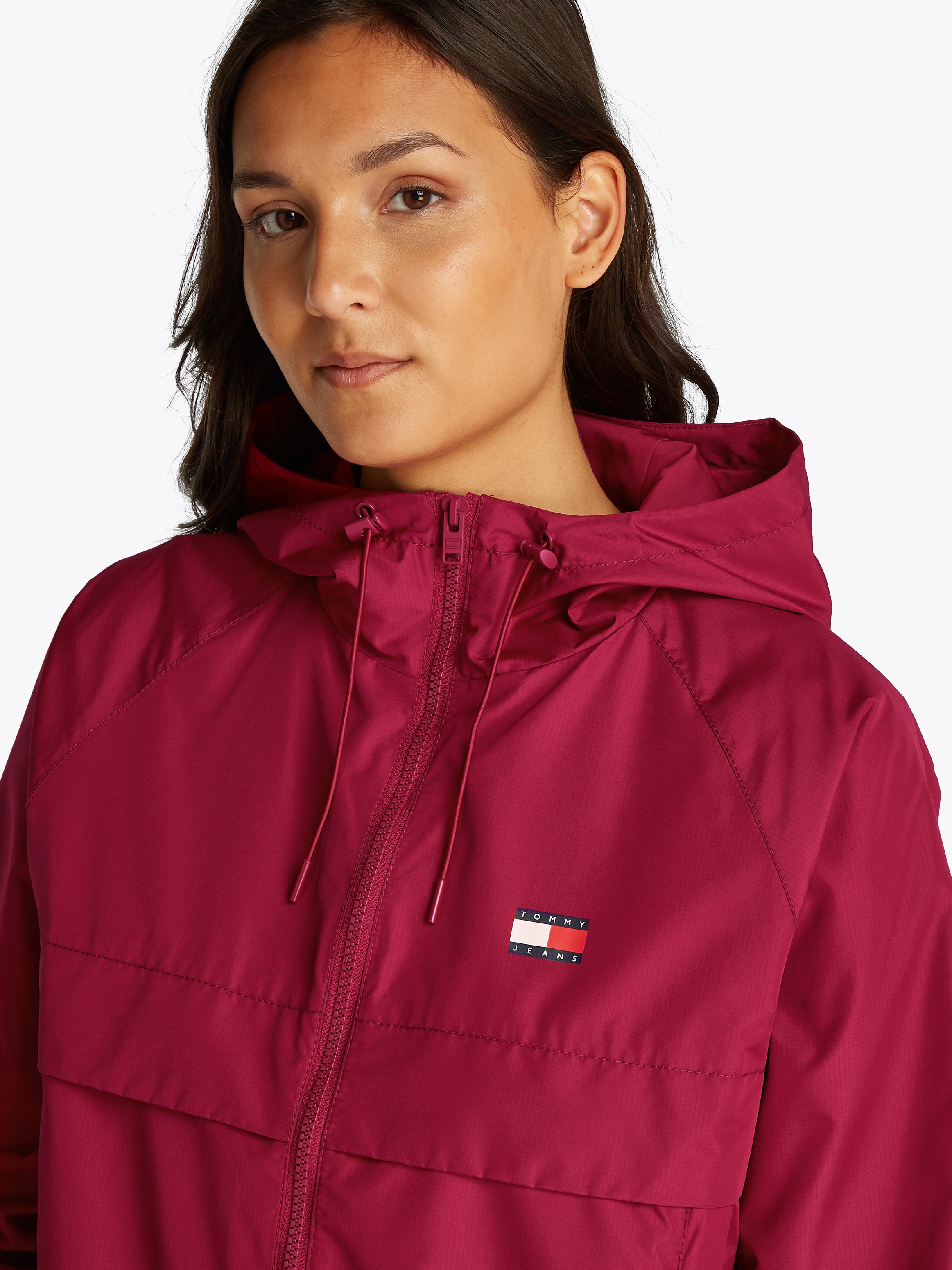 Tommy Jeans Windbreaker "TJW ESSENTIAL WINDBREAKER EXT", mit Kapuze, mit Lo günstig online kaufen