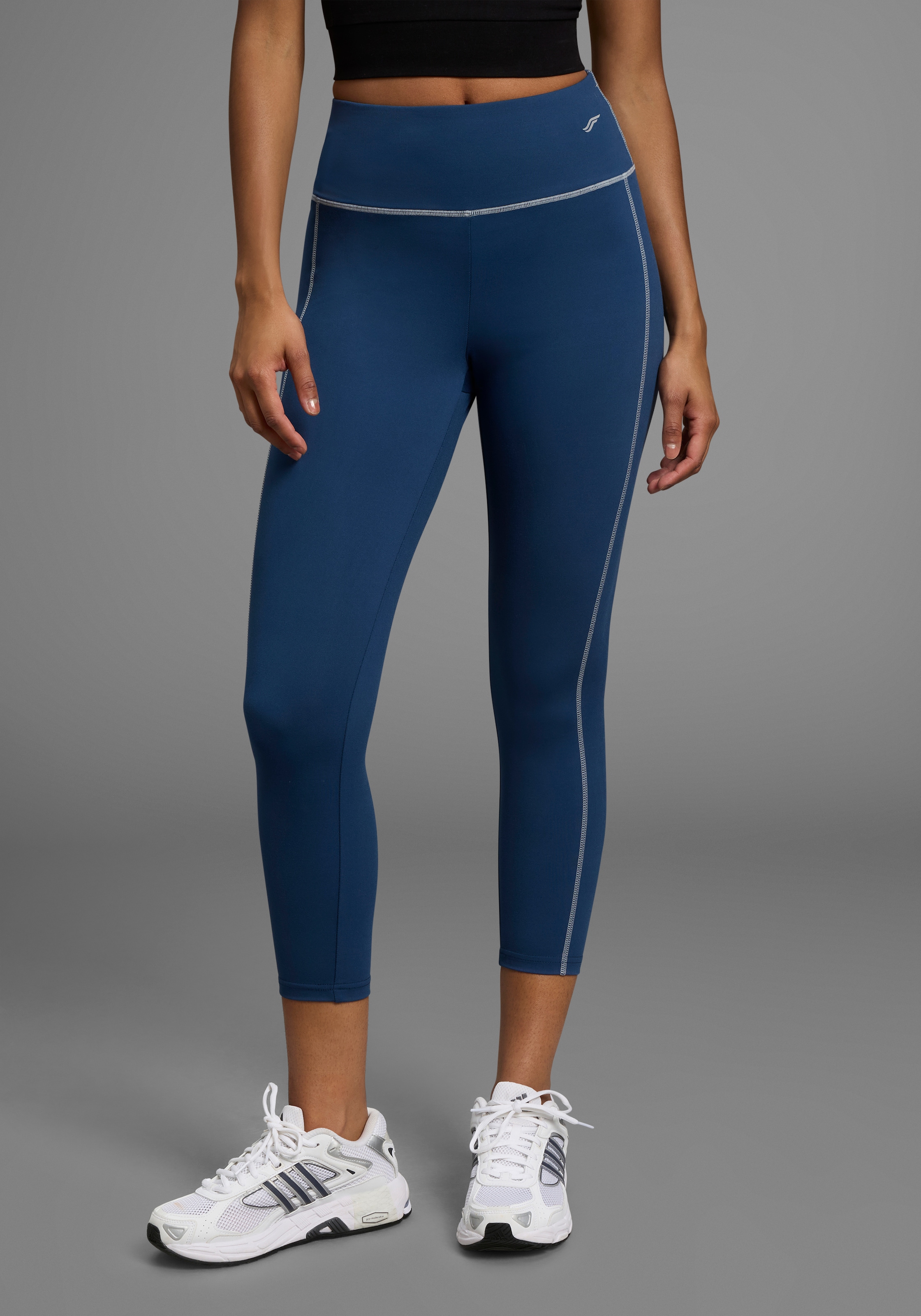 FAYN SPORTS Trainingstights, mit Reflektorprint günstig online kaufen