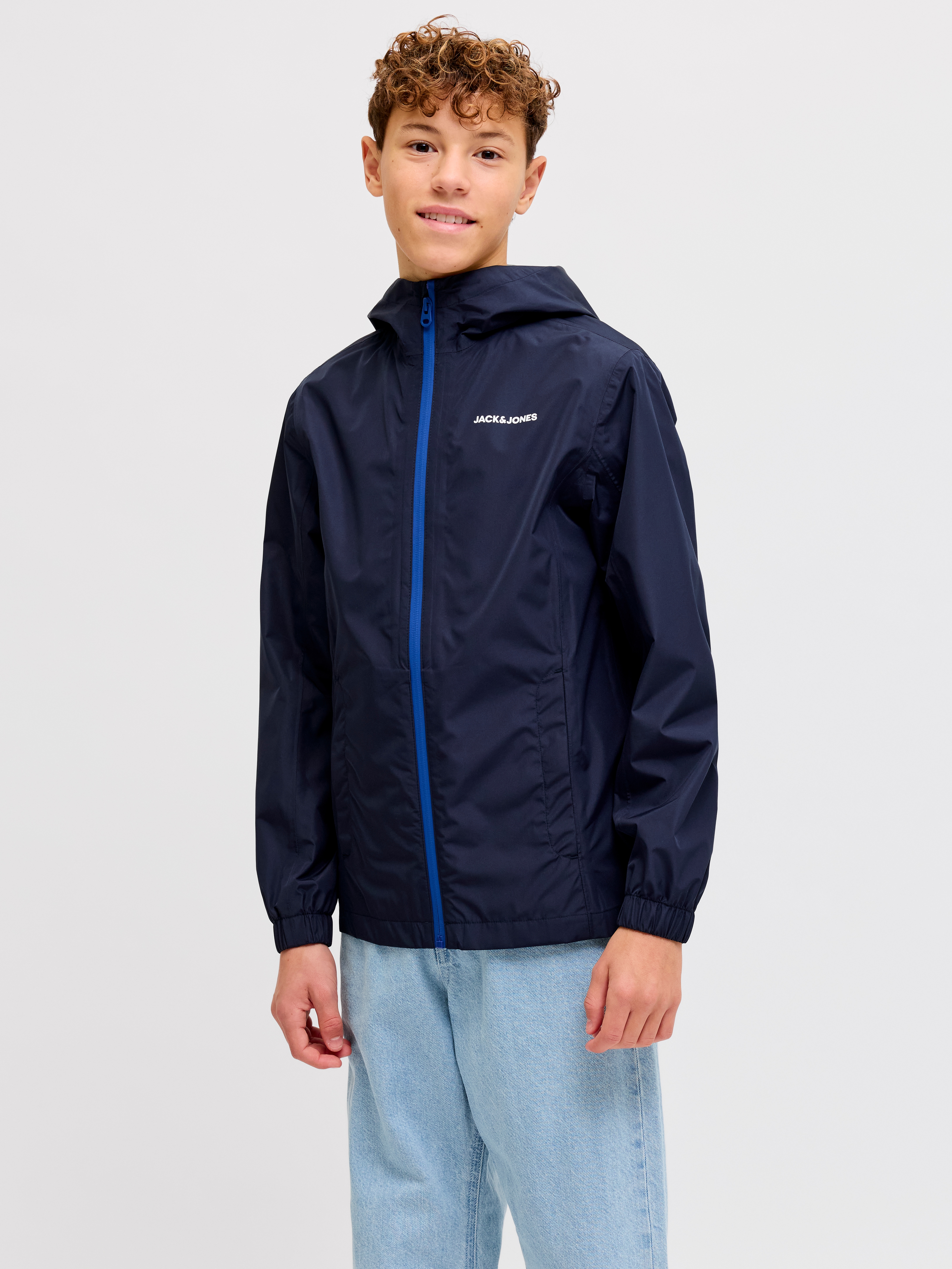 Jack & Jones Junior "JJEFLYNN RAIN JACKET SN JNR" mit Kapuze