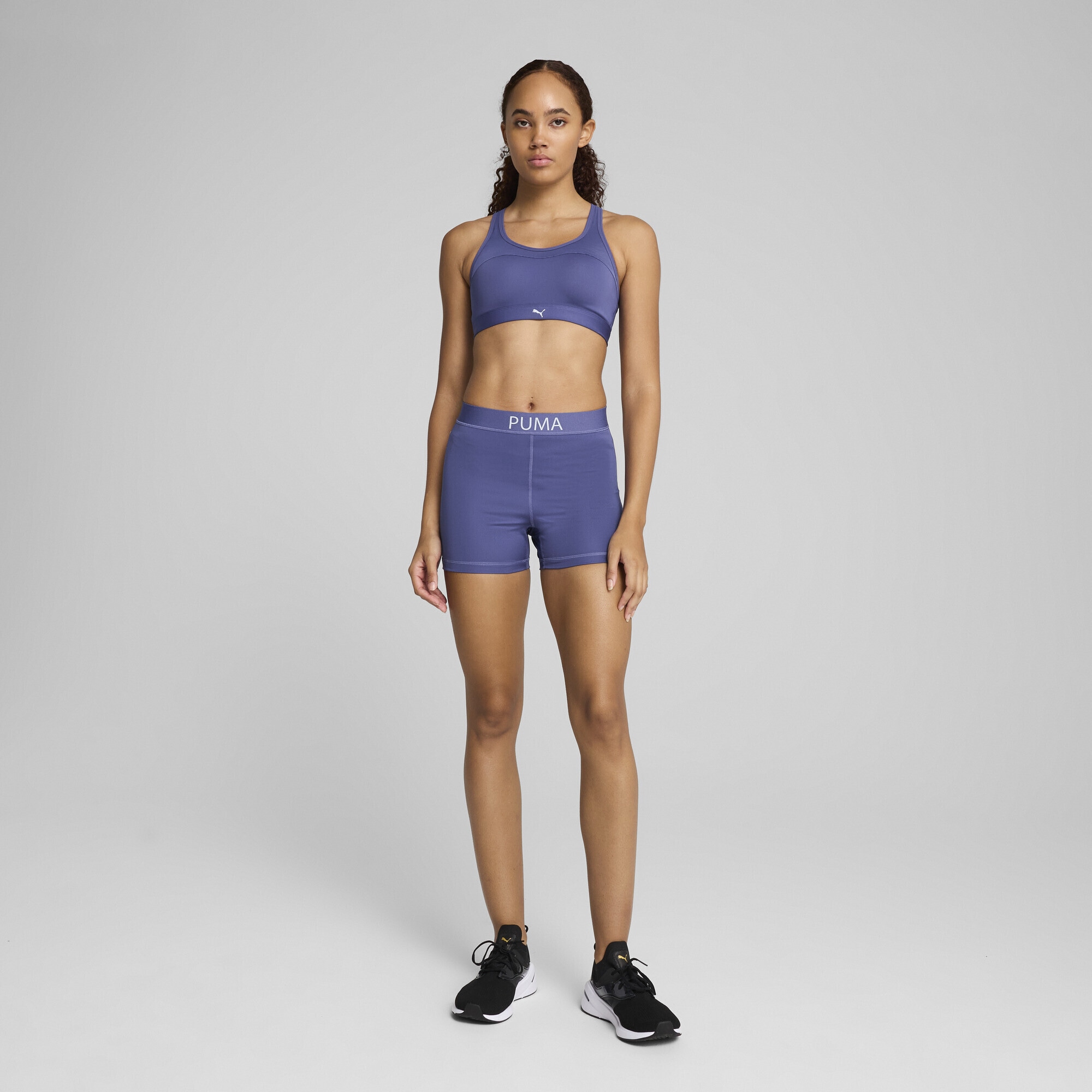 PUMA Trainingsshorts »PUMA STRONG Hochgeschnittene 4" Radlerhose Damen«