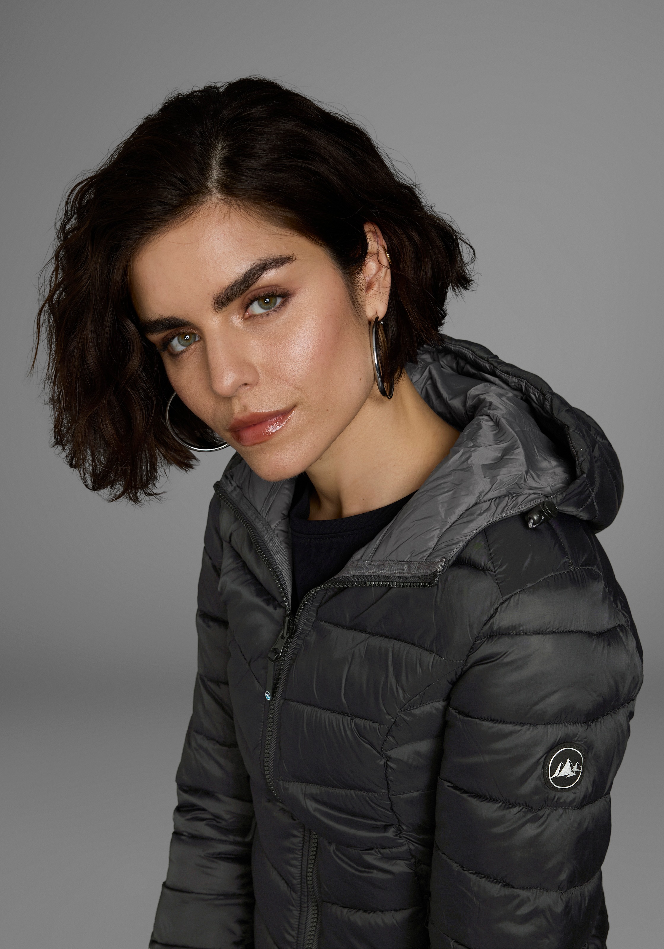 Thumbnail - Polarino Steppjacke, mit Kapuze, für kühle Tage, aus leichtem Webmaterial, wasserabweisend