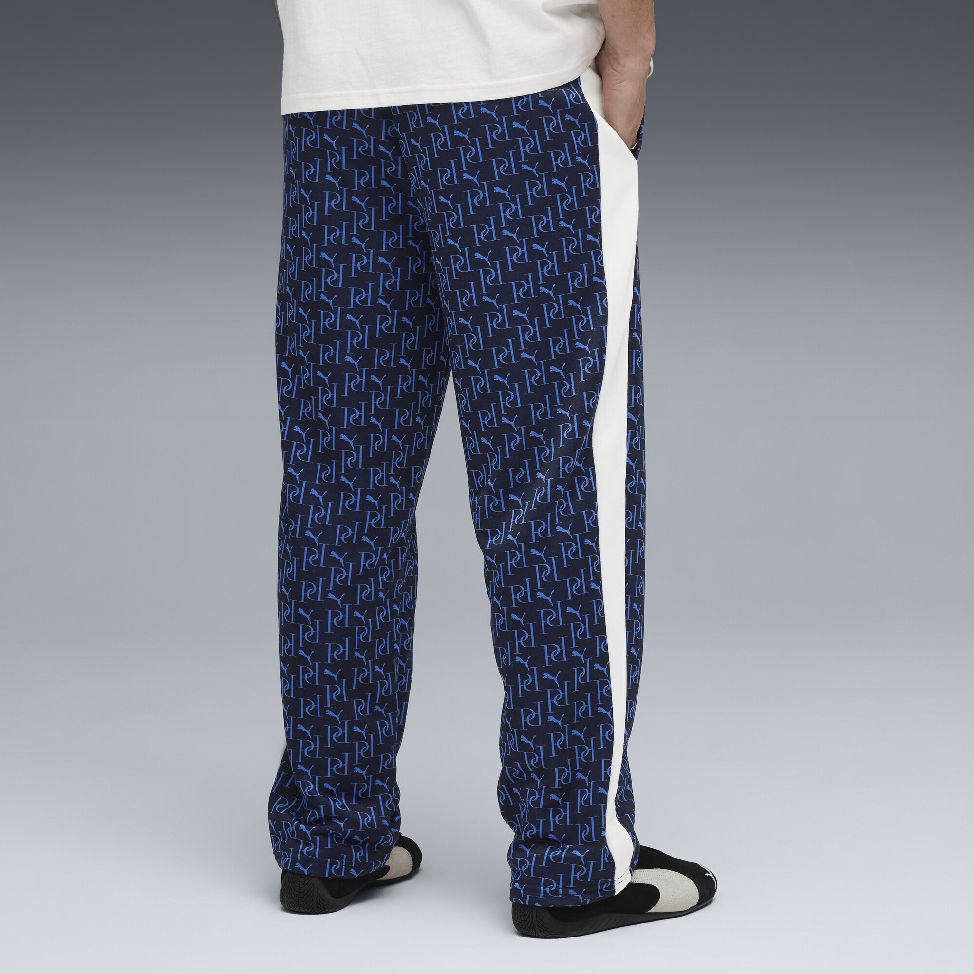 PUMA Sporthose »T7 Allover-Print Relaxed Trainingshose Herren«