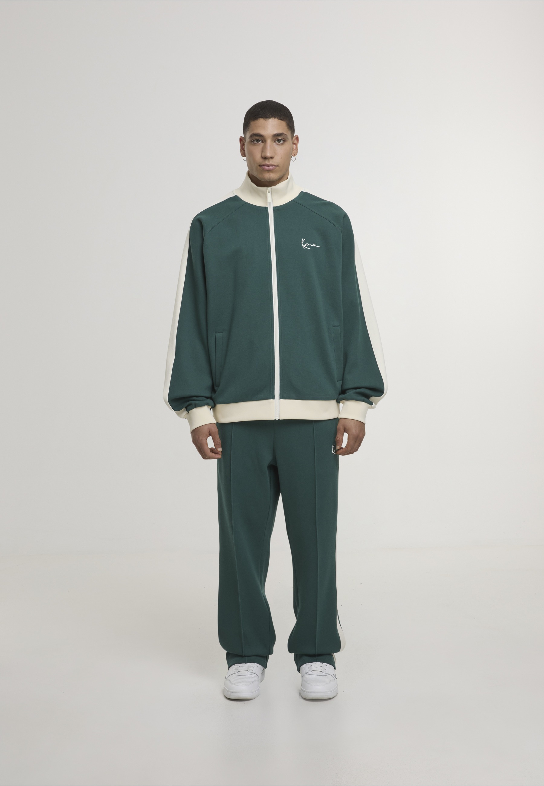 Karl Kani Outdoorjacke »Karl Kani Signature Sidestripe Pique Trackjacket« 1 Stk. tlg. ohne Kapuze