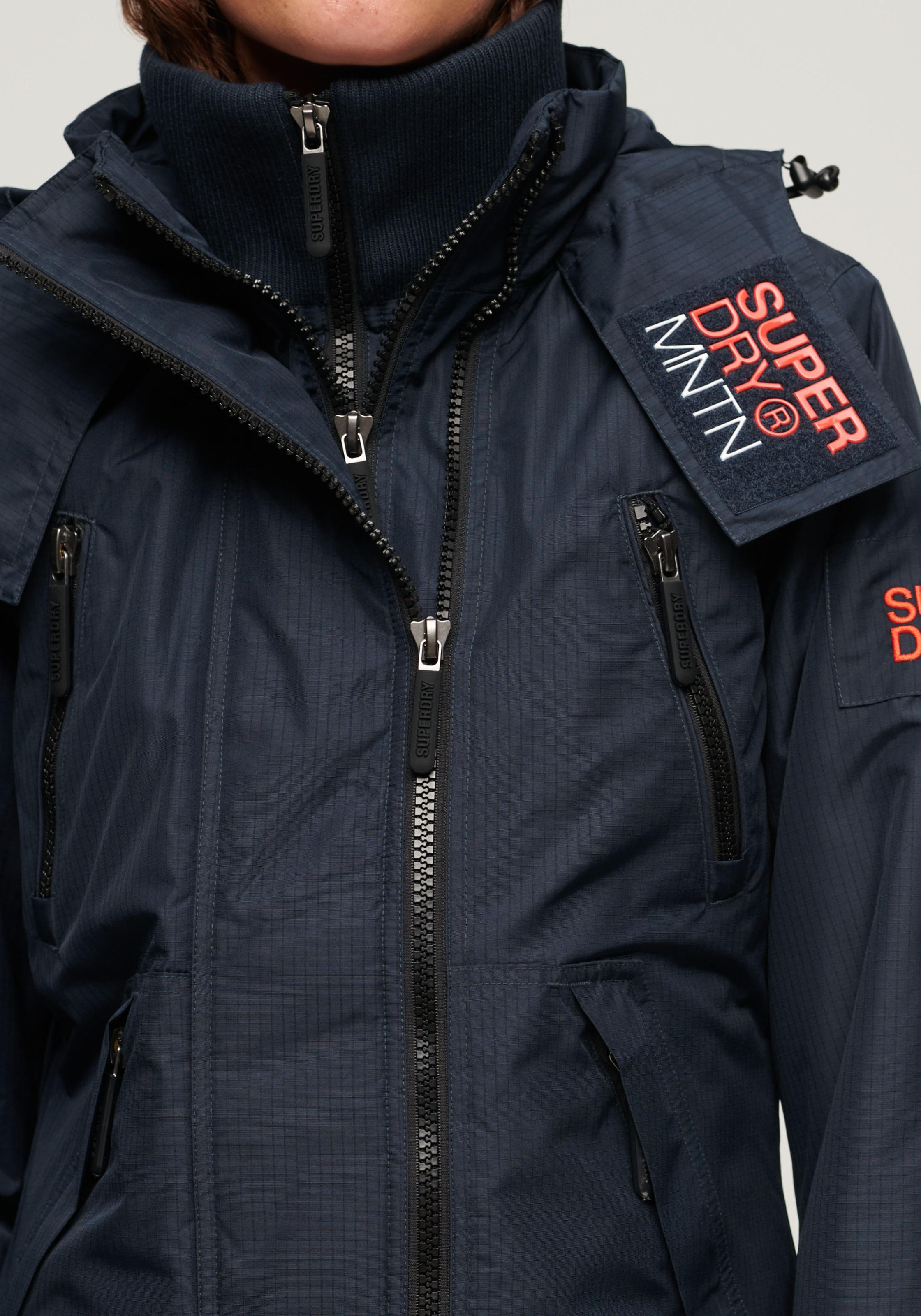 Superdry Outdoorjacke »HOOD MTN WINDBREAKER JKT«, mit Kapuze