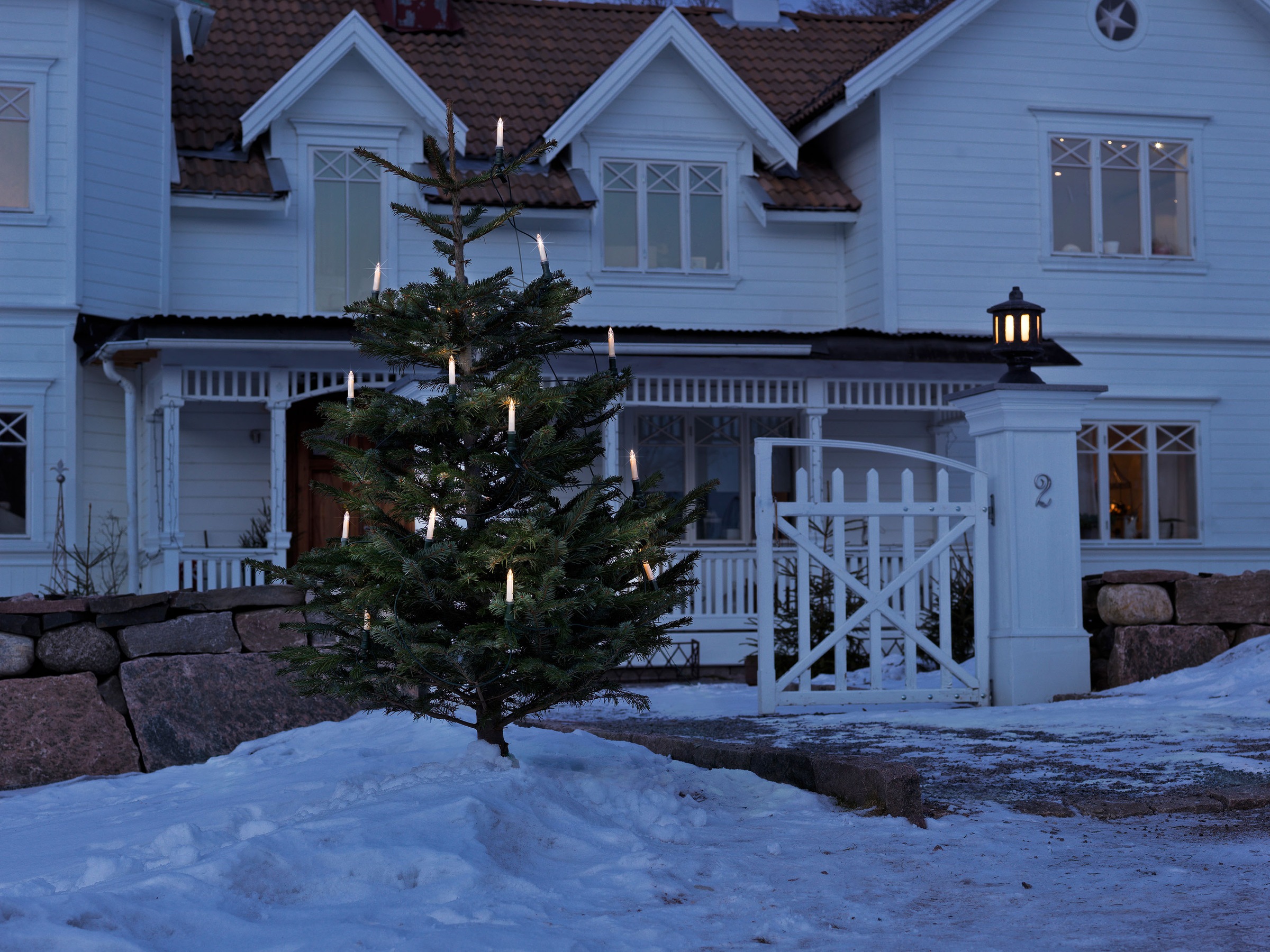 KONSTSMIDE Christbaumkerzen, 16 St.-flammig, Baumkette, Schaftkerzen, teilbarer Stecker, 16 klare Birnen