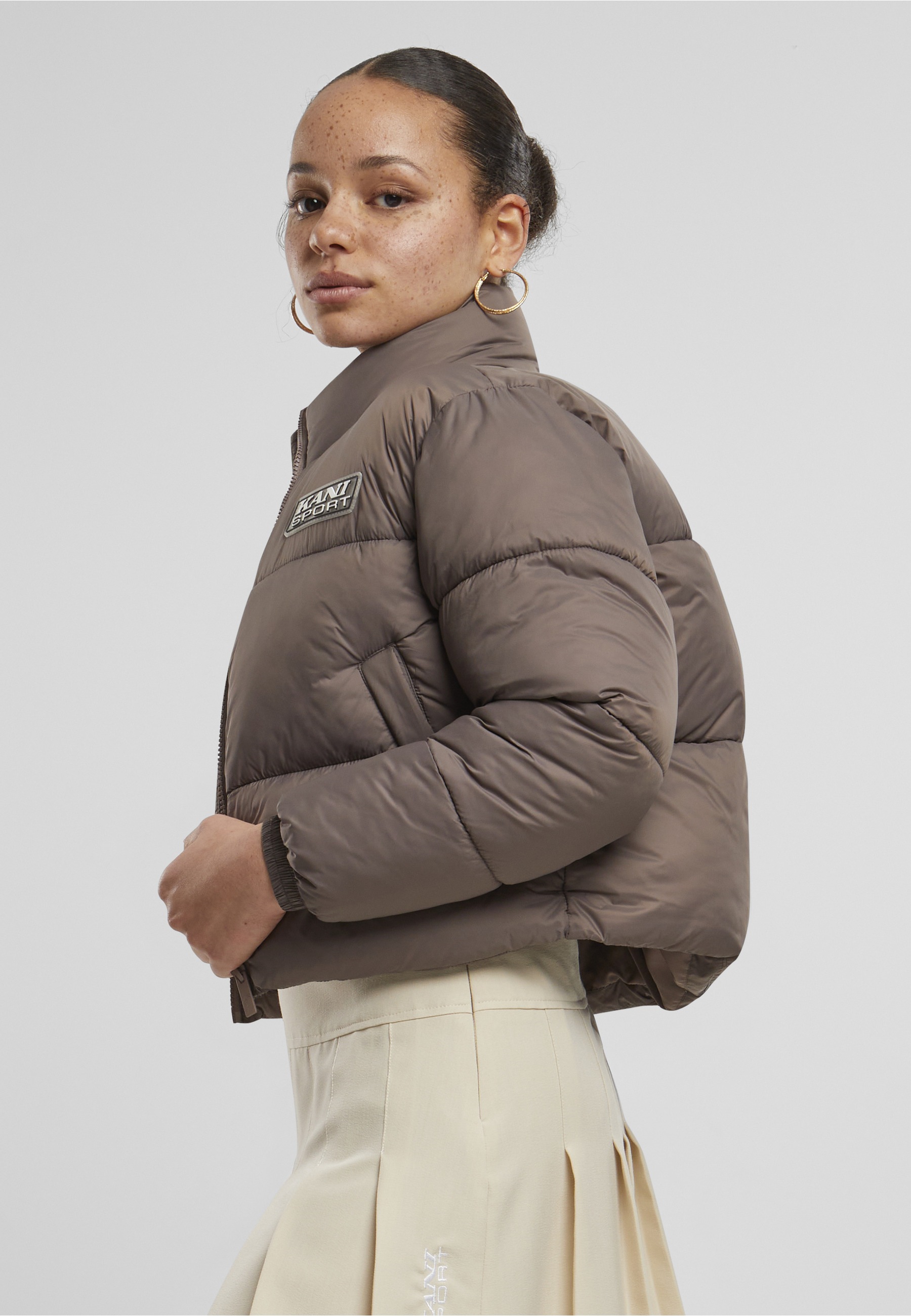 Karl Kani Winterjacke »Karl Kani Karl Kani Sport Patch Crop Puffer Jacket« 1 Stk. tlg. ohne Kapuze