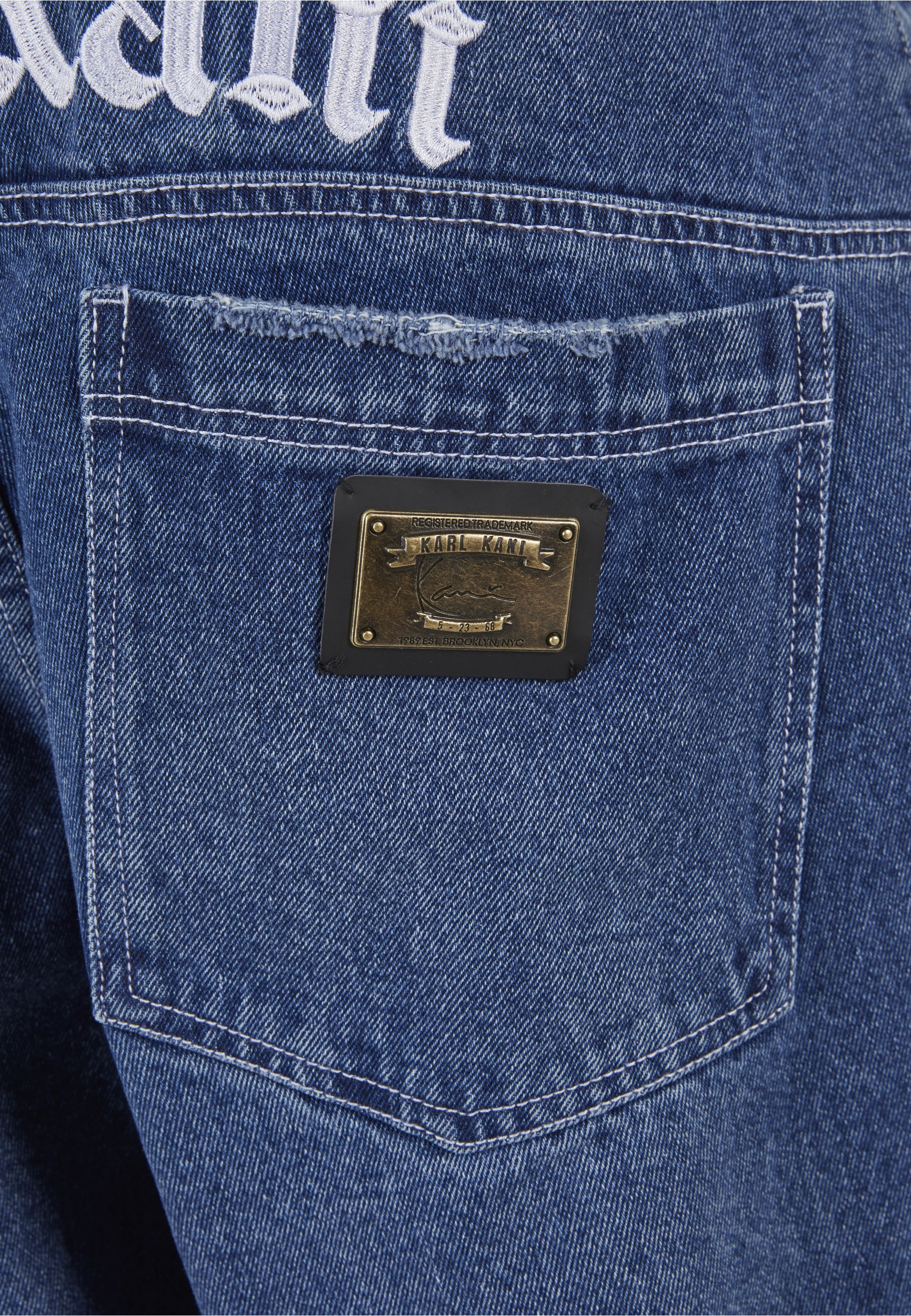 Karl Kani Bequeme Jeans »Karl Kani Herren Karl Kani Metal Plate Baggy Five Pocket Denim«