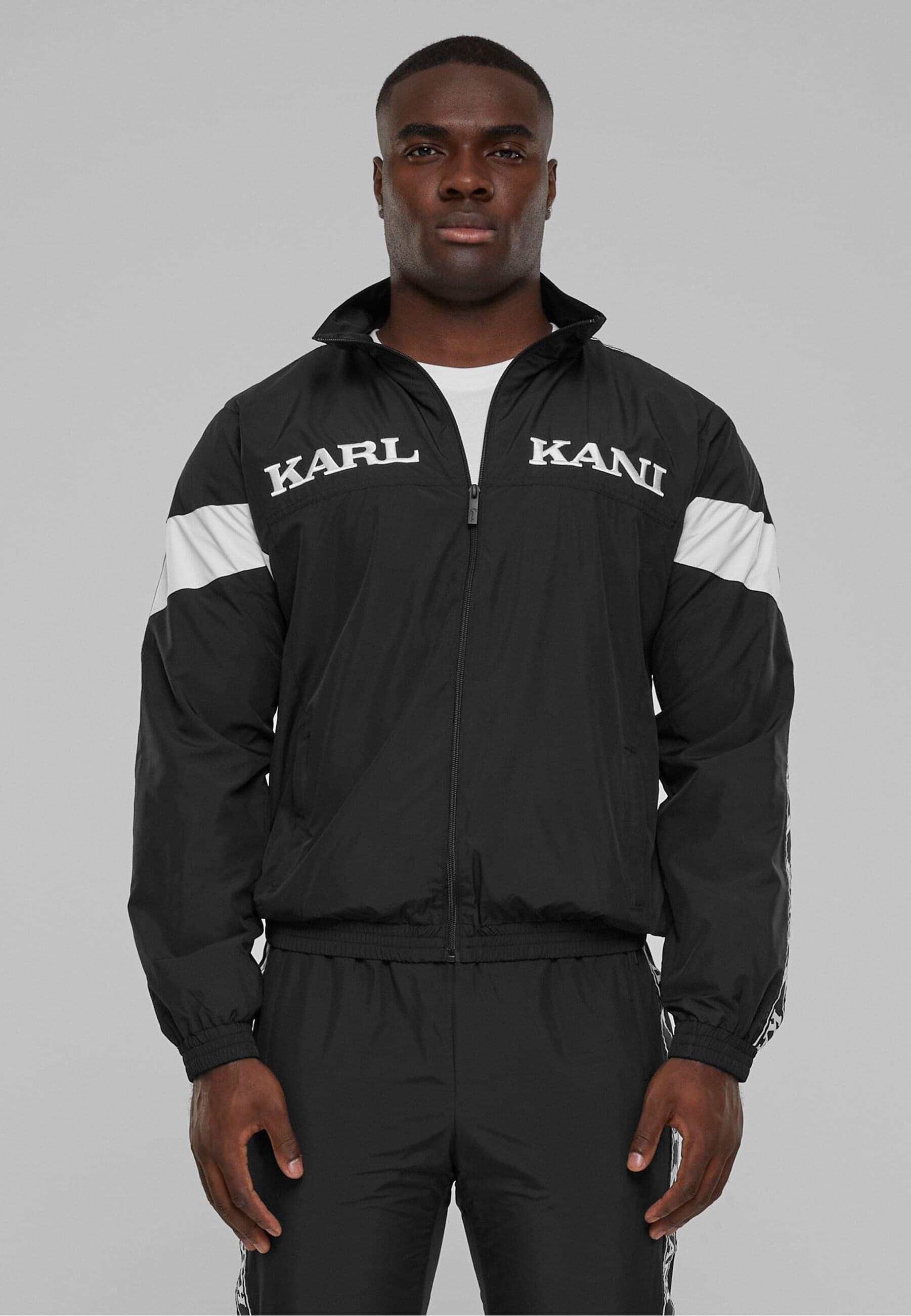 Karl Kani Allwetterjacke »Karl Kani Herren KKMQ32024BLK KK Retro Tape Trackjacket«, (1 St.), ohne Kapuze