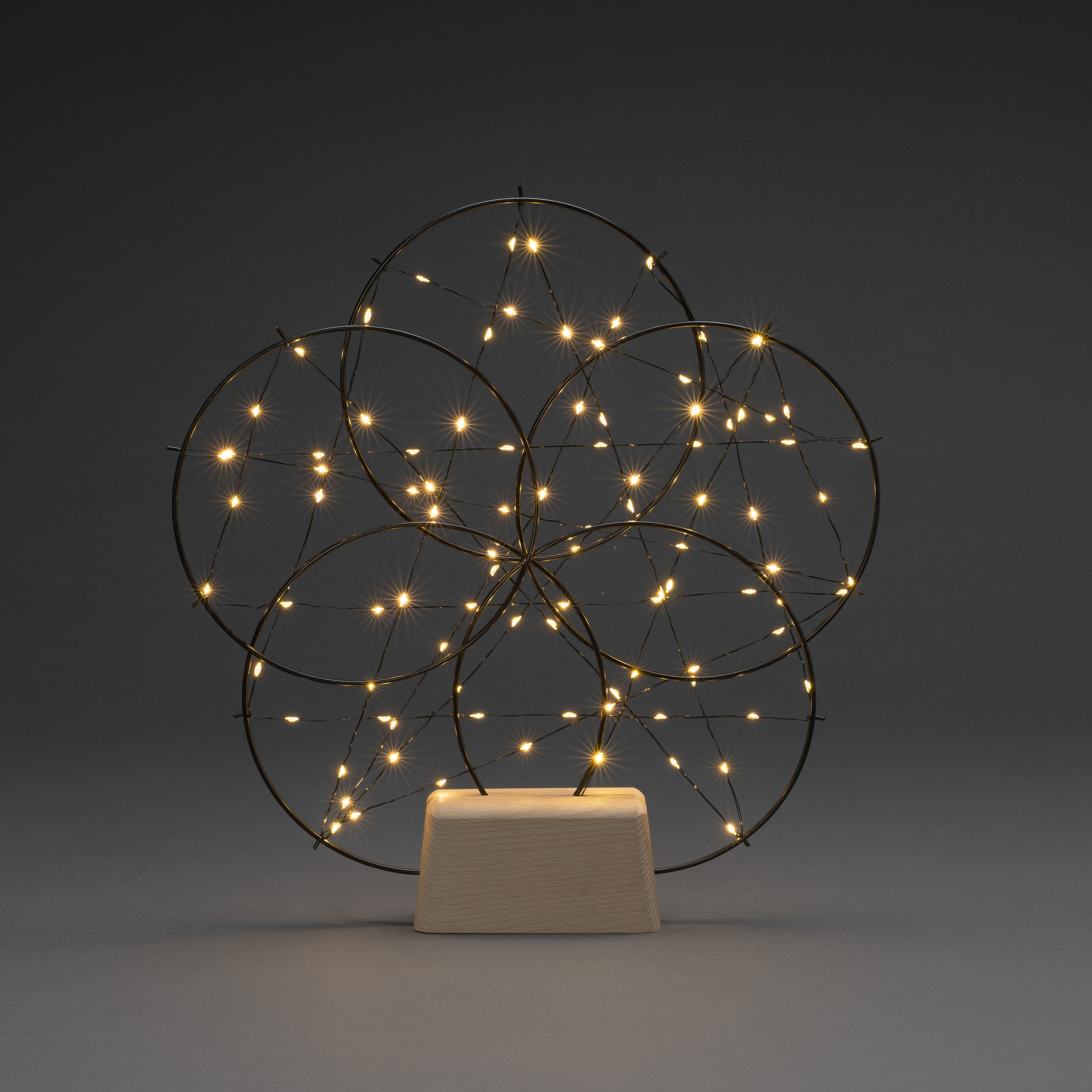 KONSTSMIDE LED Dekolicht »Weihnachtsdeko«, 100 flammig, Leuchtmittel LED-Modul | LED fest integriert, LED Metallsilhouette "5 kleine Ringe", mit Holz-Fuß