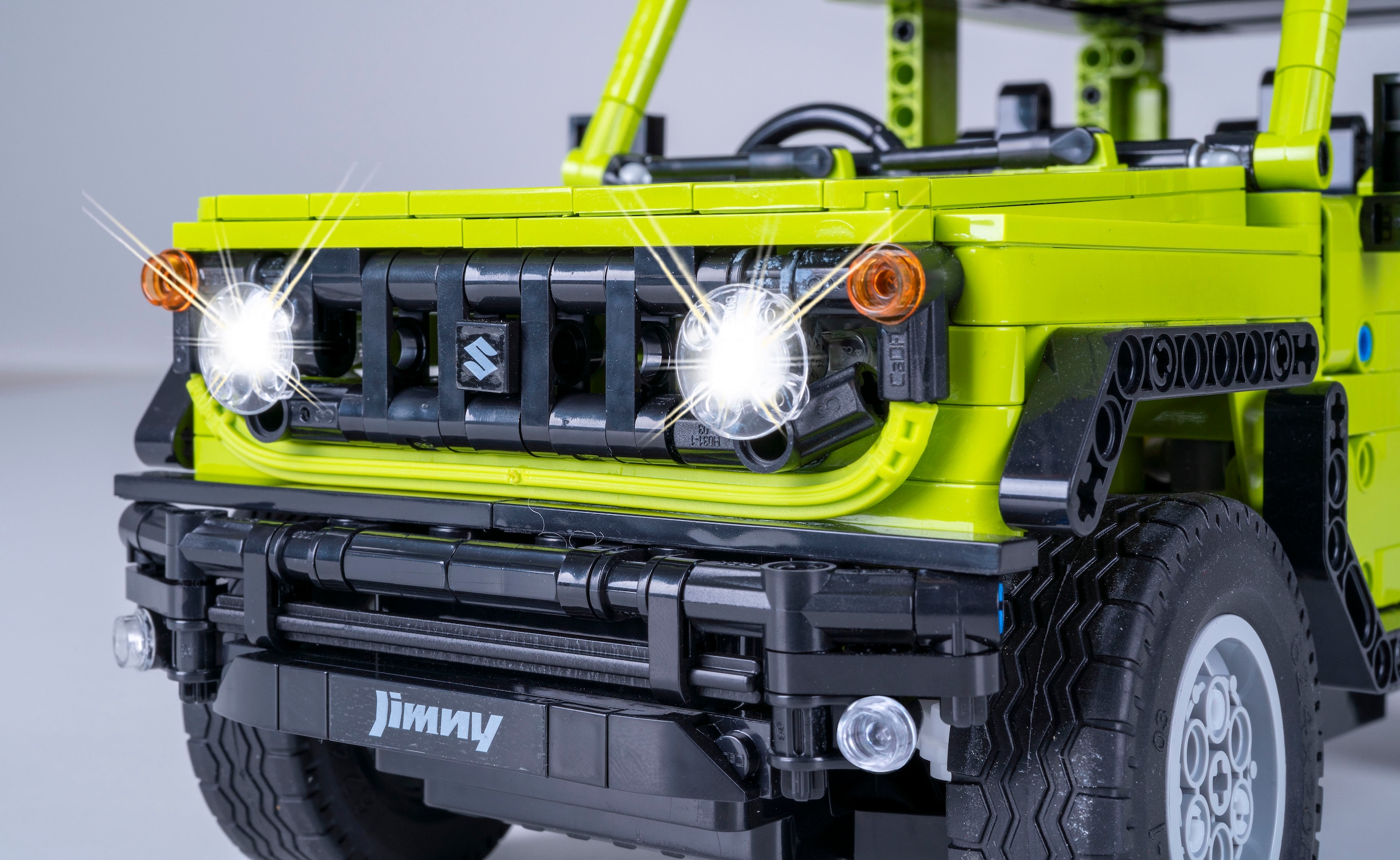 Jamara RC-Auto »CaDA, Suzuki Jimny 1:12 grün 2,4GHz Bricks«, (579 tlg.), mit LED Licht