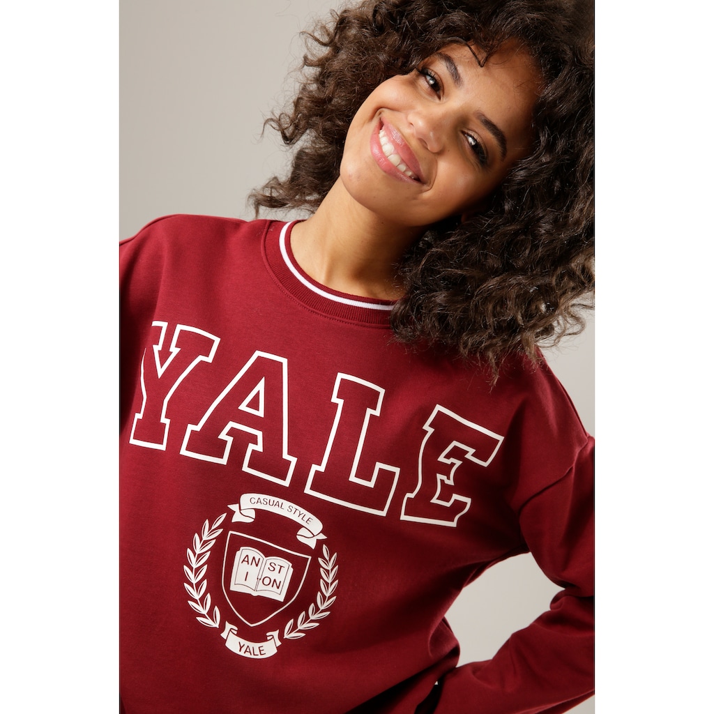 Aniston CASUAL Sweatshirt, mit "YALE"-Schriftzug und Druck im Vorderteil