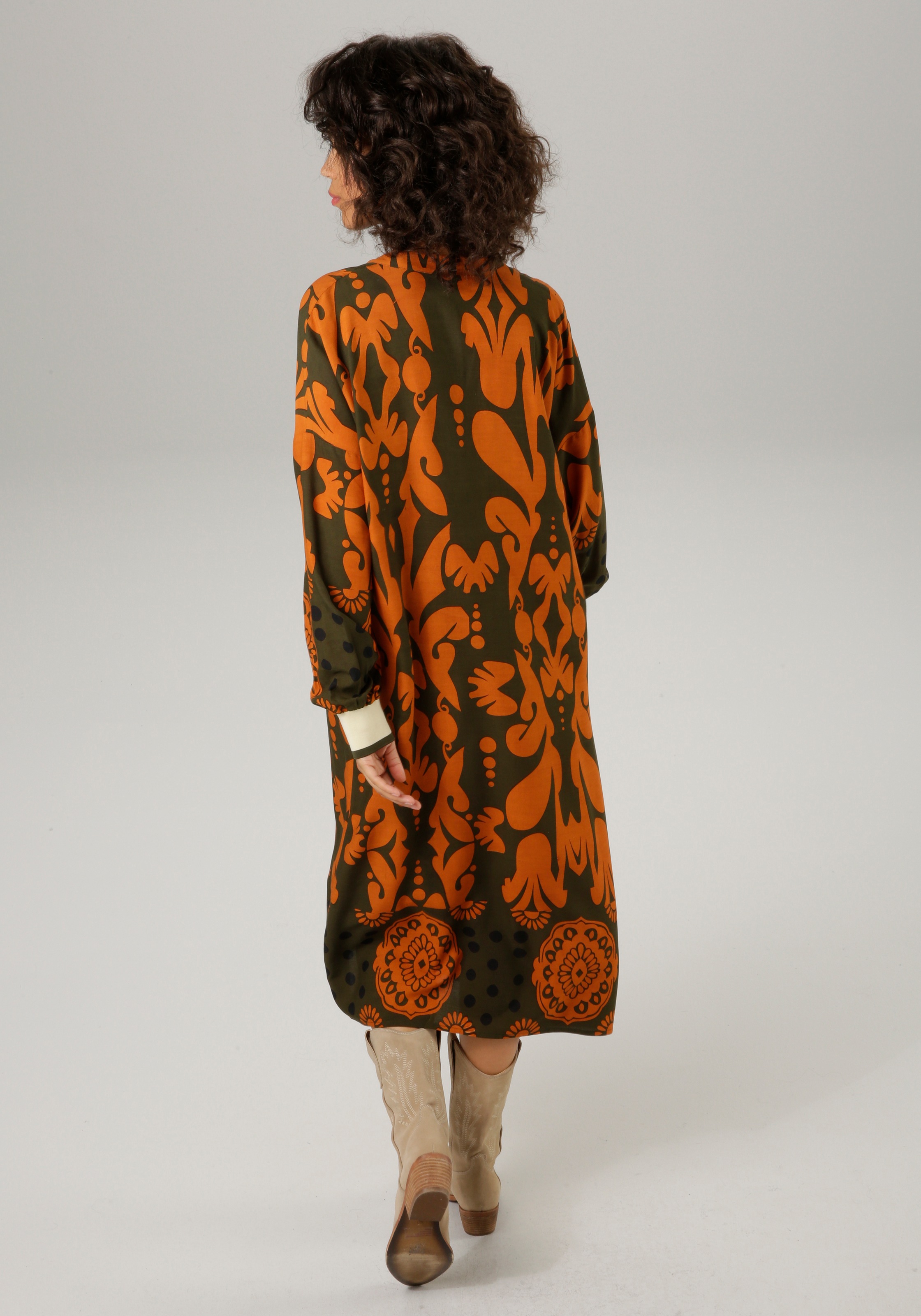 Aniston CASUAL Blusenkleid Eingrifftaschen mit großflächigem, grafischen Dr günstig online kaufen