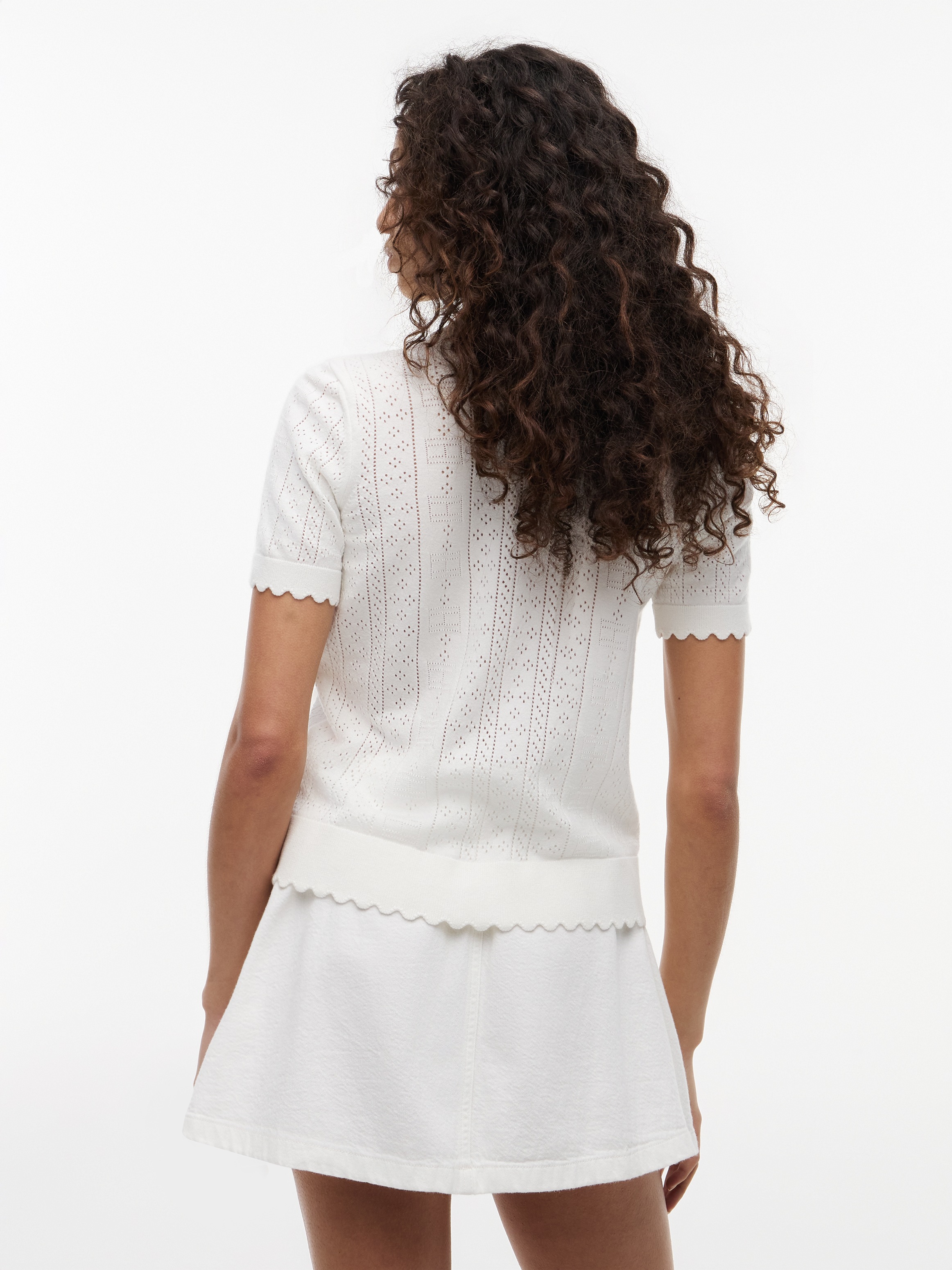 Tommy Jeans Kurzarmpullover »TJW POINTELLE POLO SWEATER« Viskosemischung, Pointelle Strickmuster, gewellte Säume