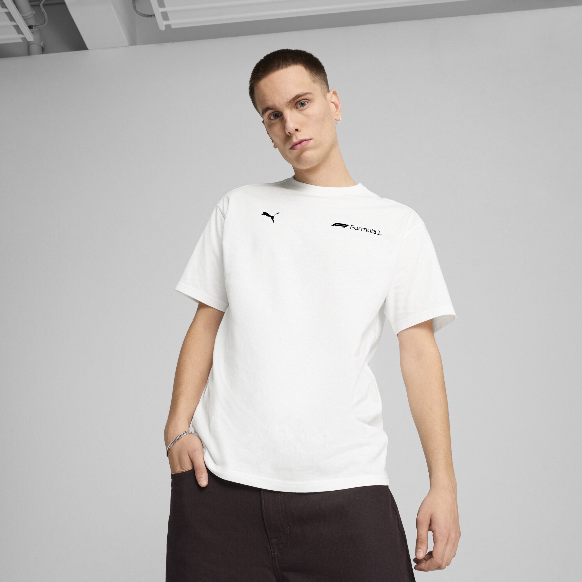 PUMA T-Shirt »F1® ESS+ Relaxed Graphic T-Shirt Herren«
