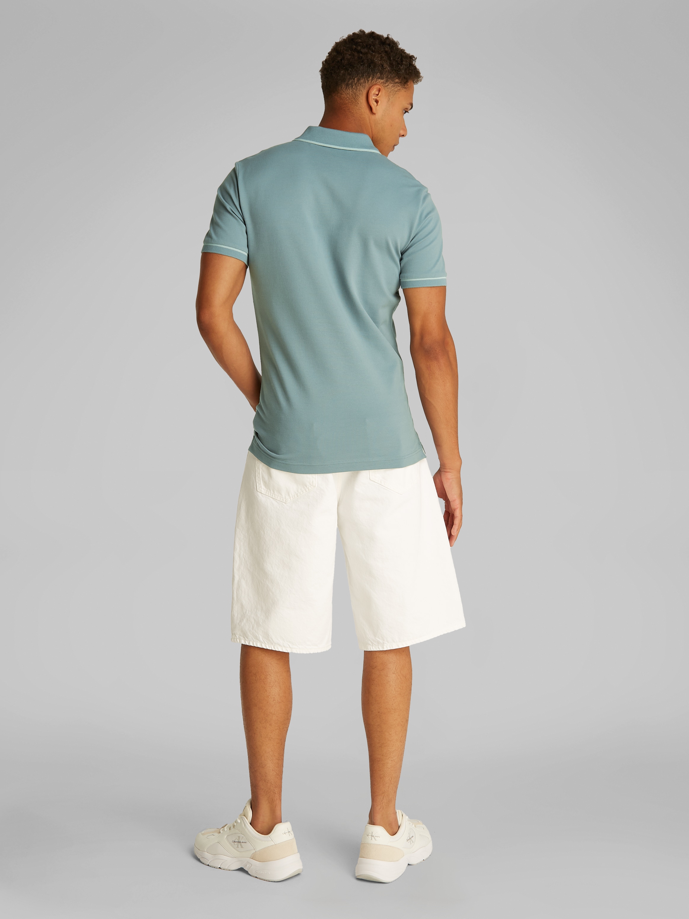 Calvin Klein Jeans Poloshirt »TIPPING SLIM POLO«, mit Streifendetail am Kragen
