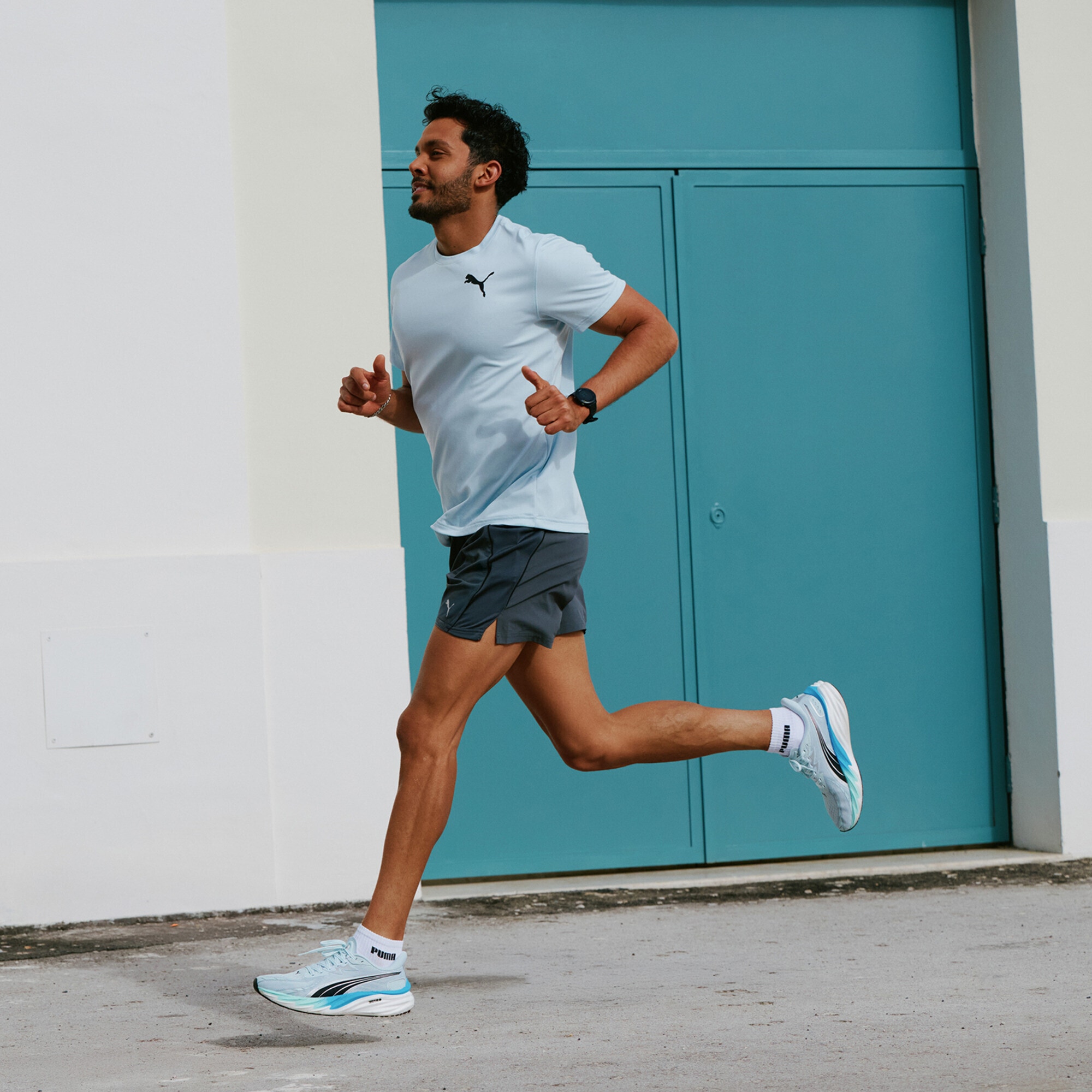 PUMA Laufshirt »Graphics Running Faster T-Shirt Herren«