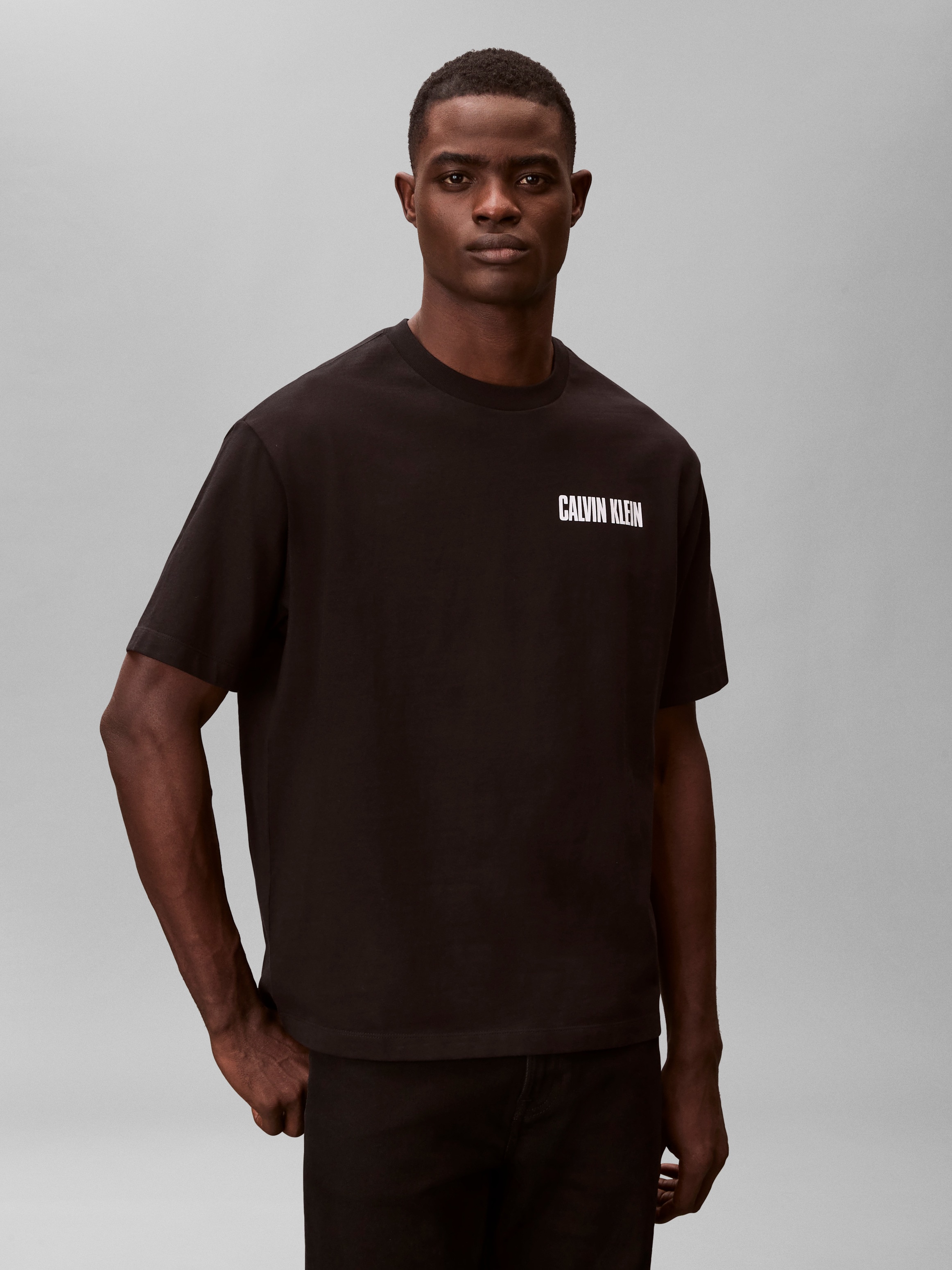 Calvin Klein Jeans T-Shirt "VERT LOGO GRAPHIC CREW" Regular fit mit Markenprint
