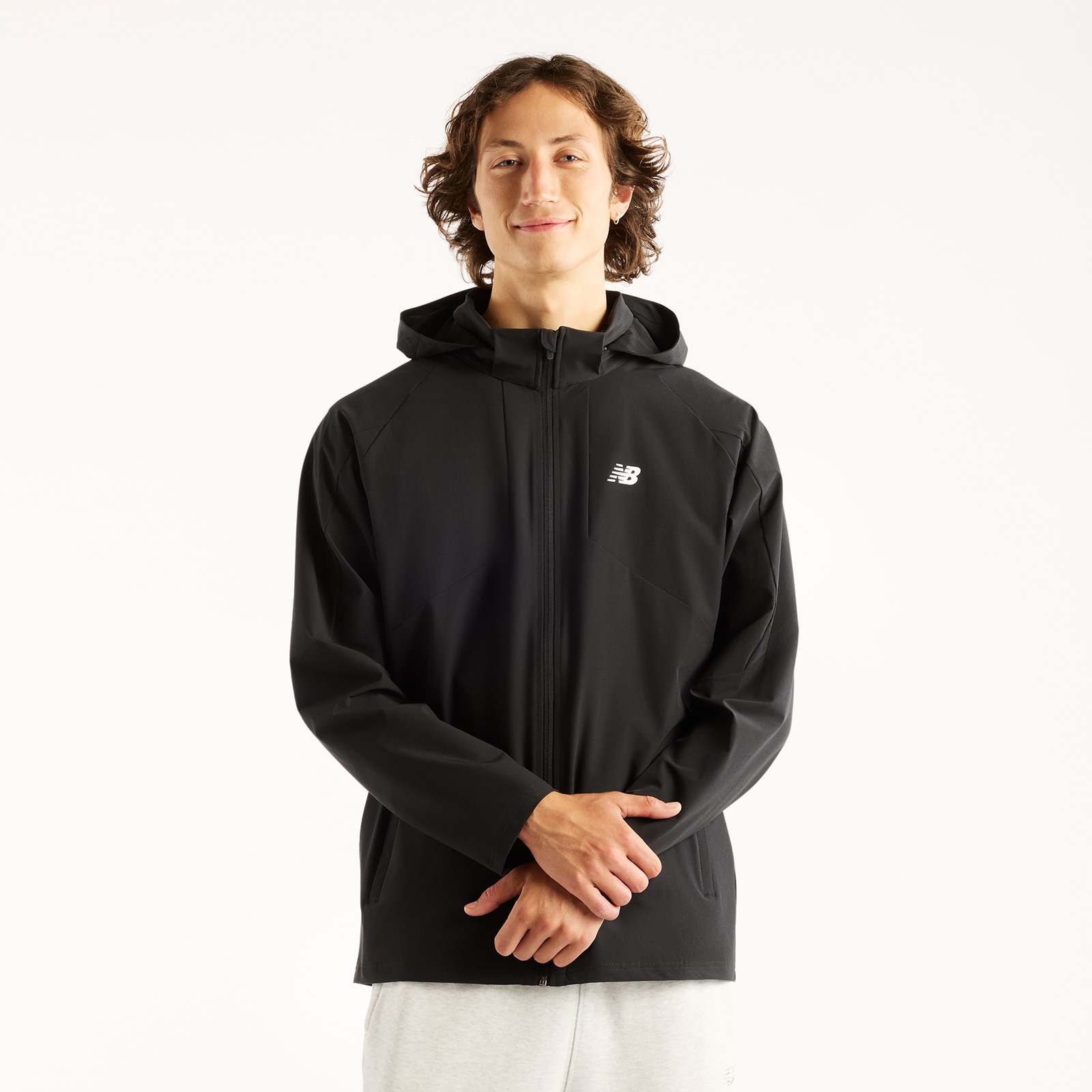 New Balance Trainingsjacke "UTILITY STRETCH WOVEN JACKET" Trainingsjacke für Fitness und sportliche Aktivitäten