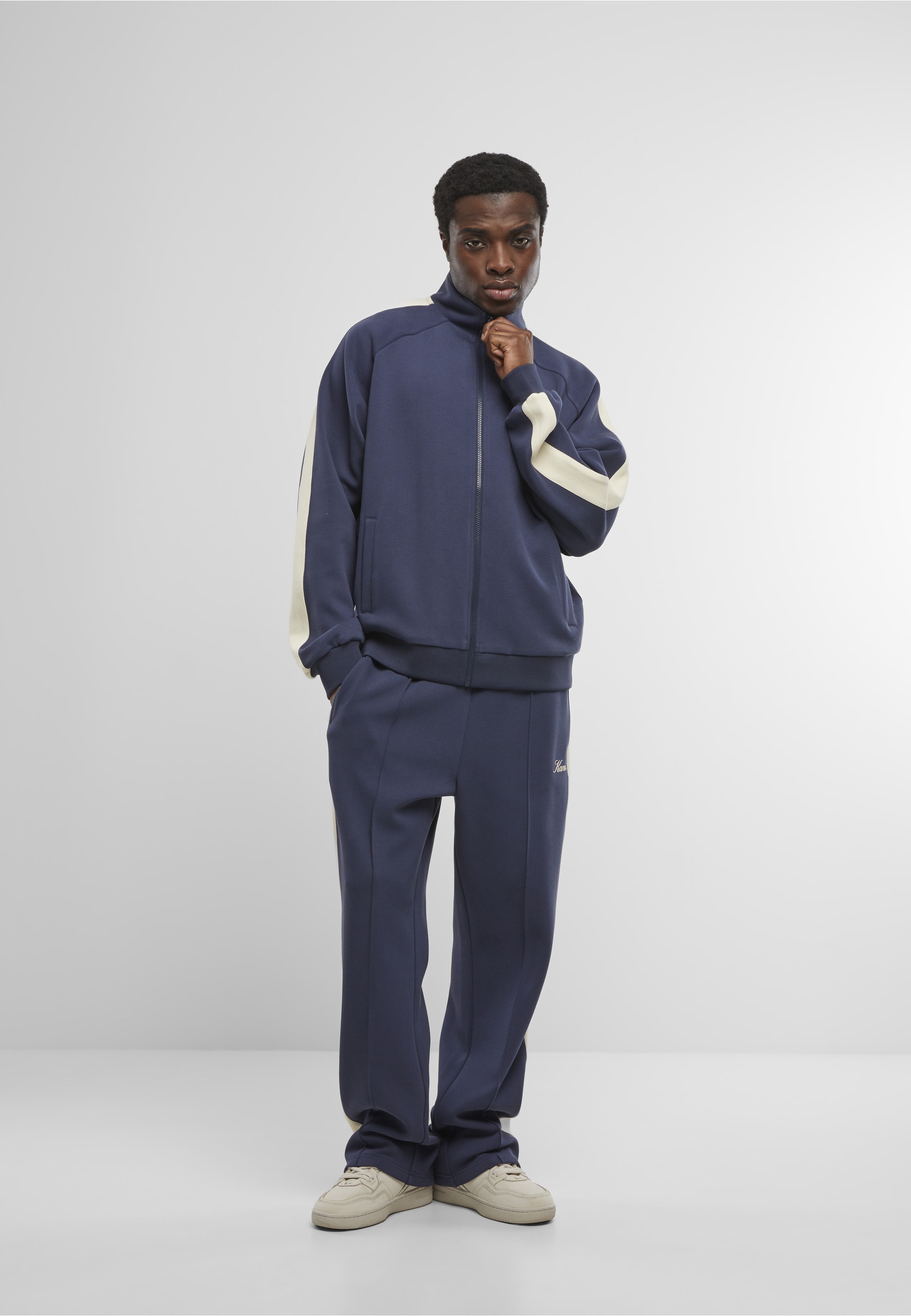 Karl Kani Trainingsjacke »Karl Kani Kani Sidestripe Trackjacket« 1 Stk. tlg. ohne Kapuze