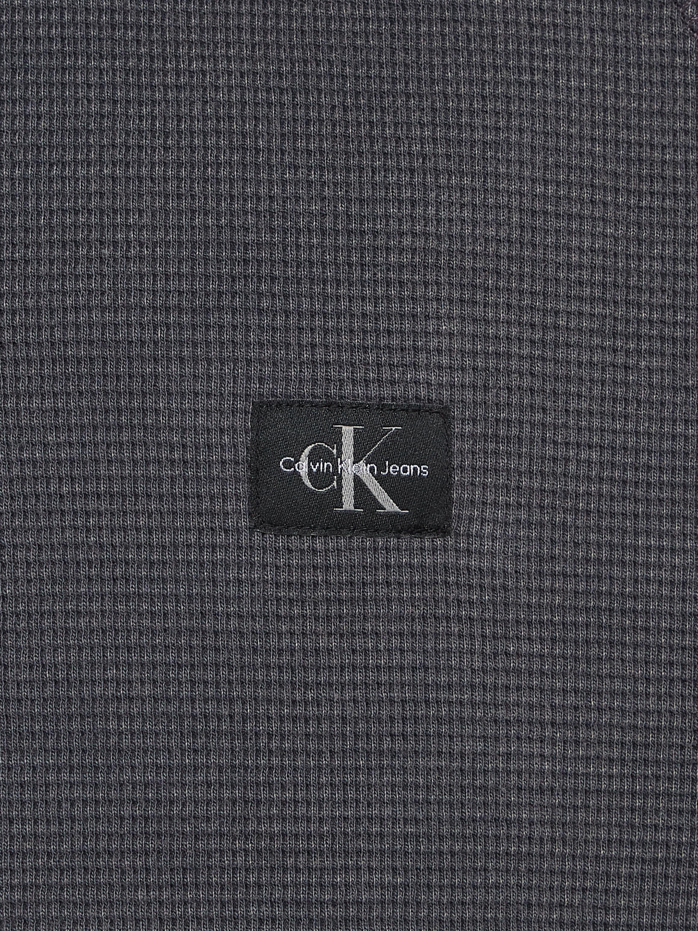 Calvin Klein Jeans Langarmshirt »WASHED WOVEN LABEL WAFFLE RAGLAN«, in gewaschener Qualität