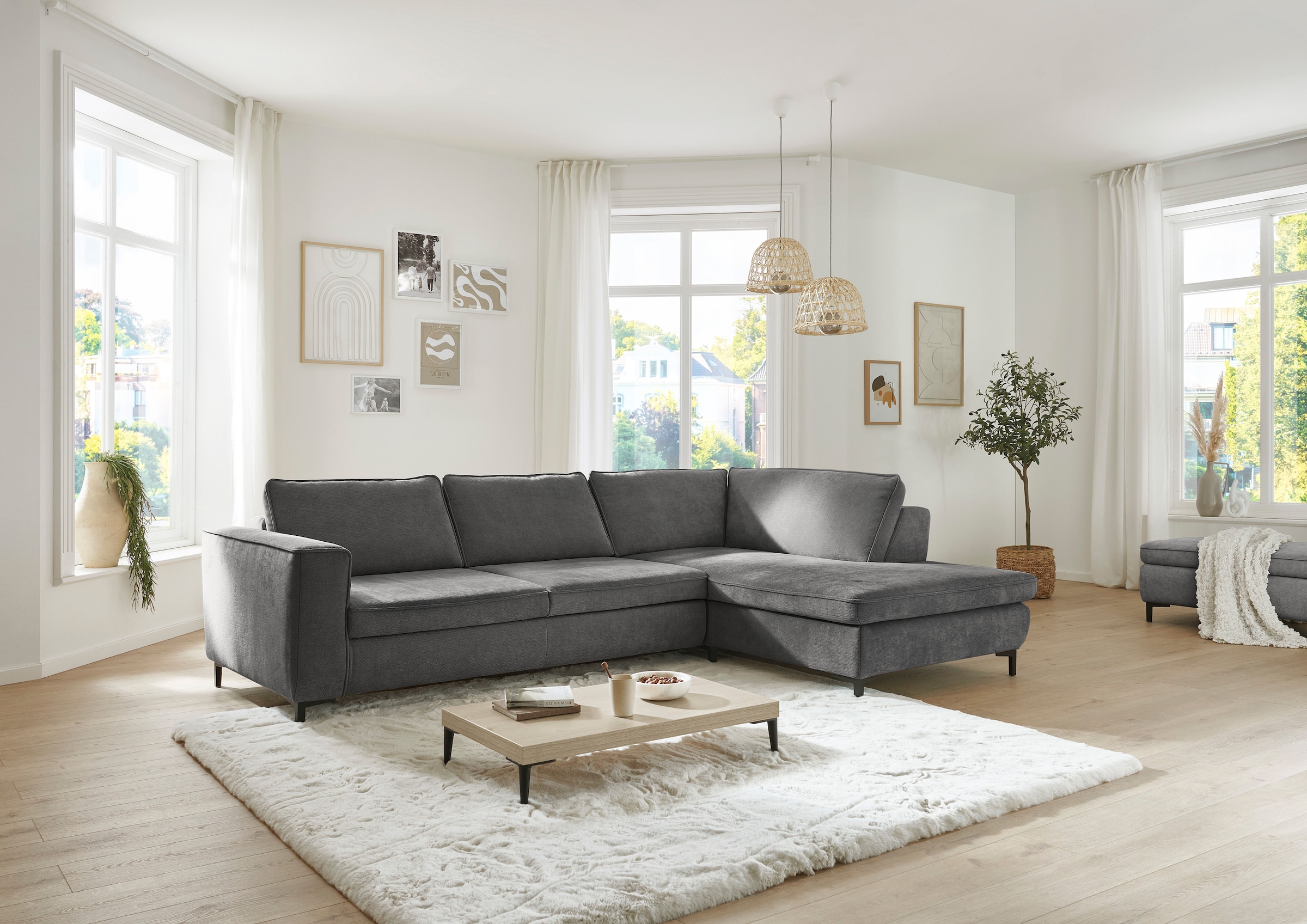 Die PlanBar Ecksofa "MP-IN24153, L-Form, Breite 289 cm" wahlweise mit Schlaffunktion und verstellbaren Kopfstützen