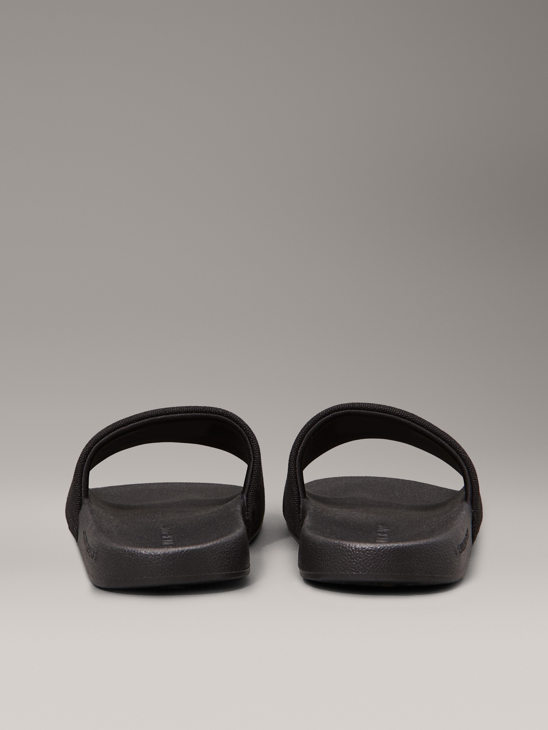 Calvin Klein Jeans Pantolette »SLIDE MONOGRAM WMNS«, Poolslides, Schlappen, Sommerpantolette, Strandschuh zum Schlupfen