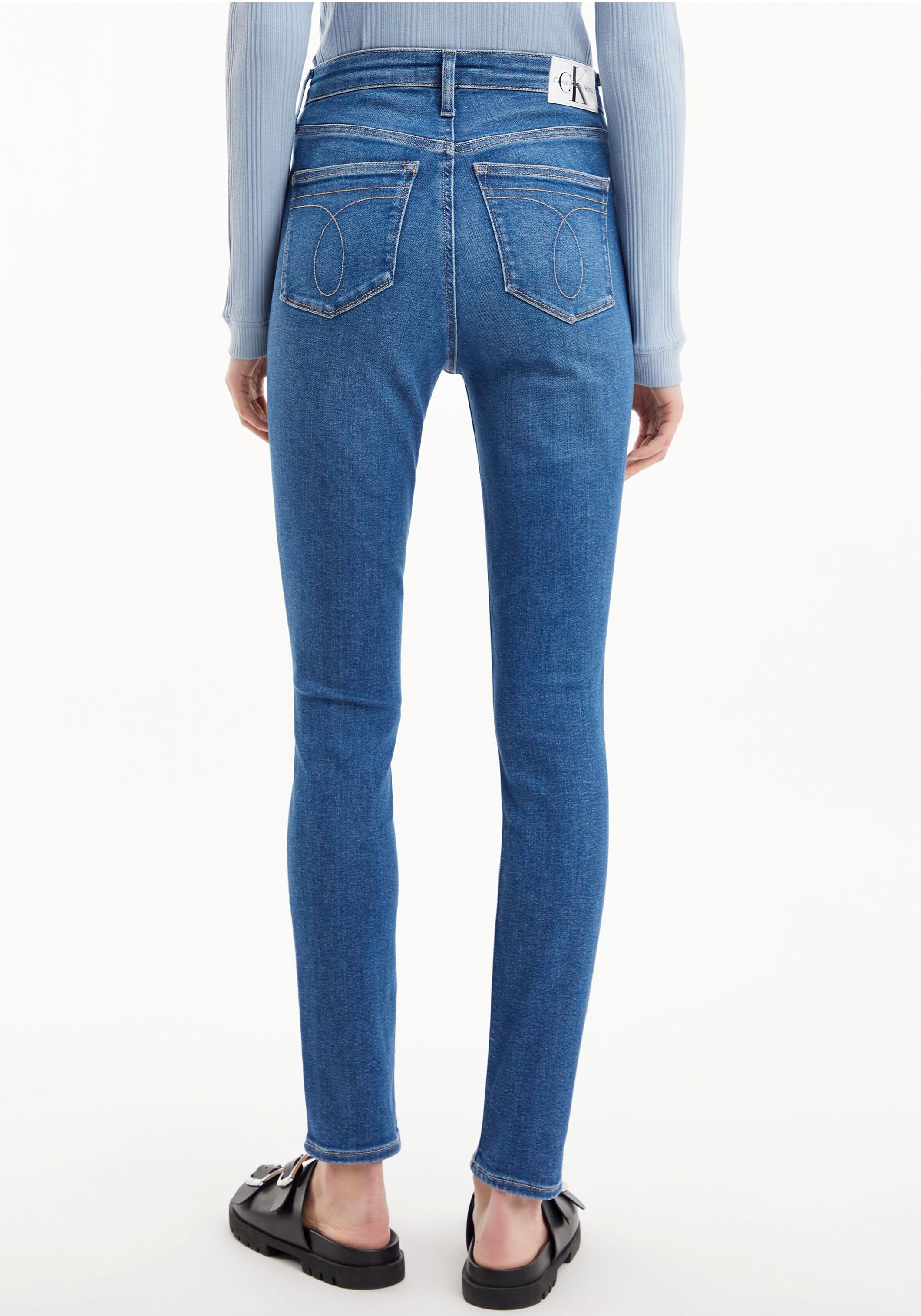 Calvin Klein Jeans Skinny-fit-Jeans »HIGH online RISE hinten SKINNY«, | am bestellen BAUR Klein mit Calvin Leder-Brandlabel Bund